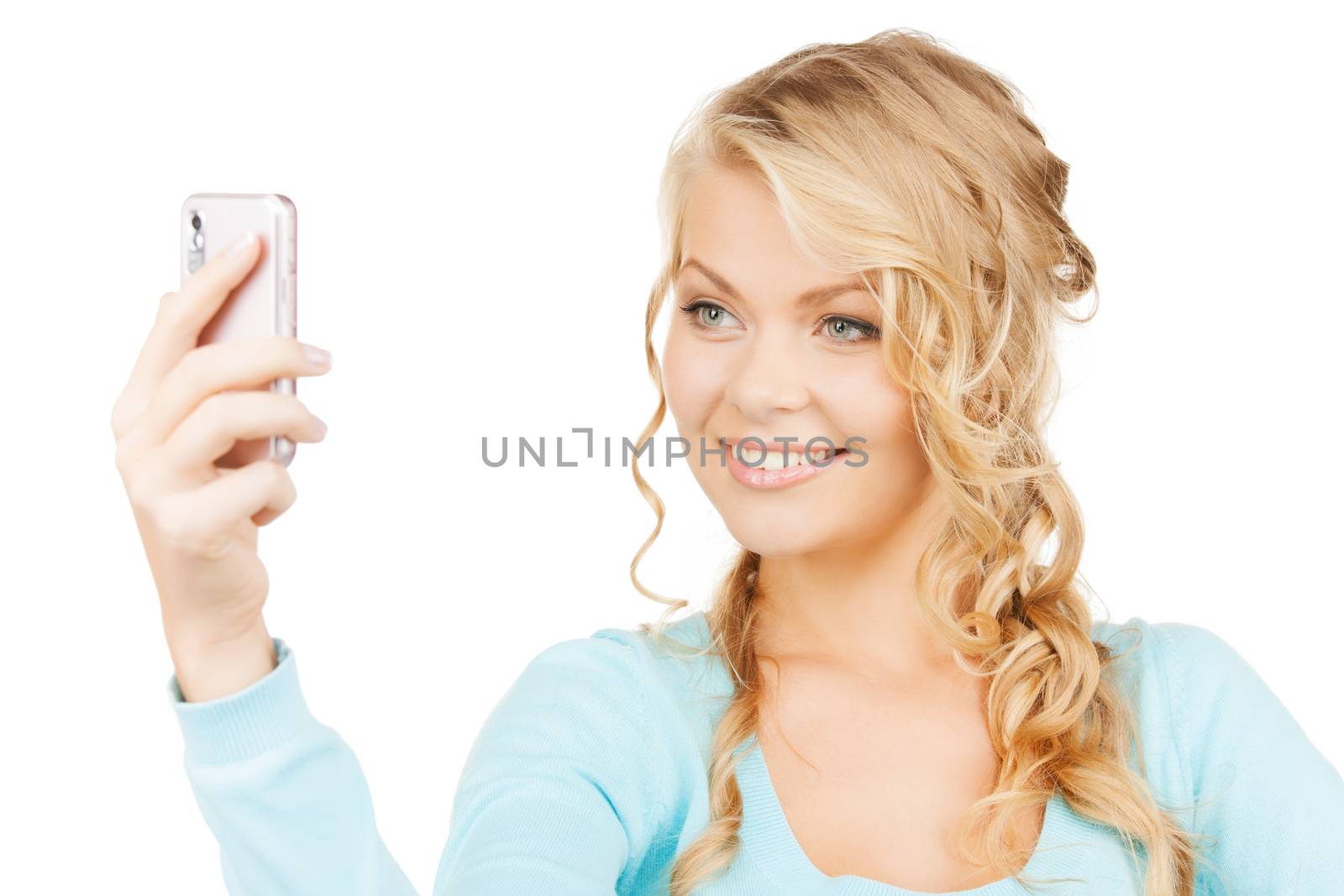 technology concept - smiling woman taking photo with smartphone