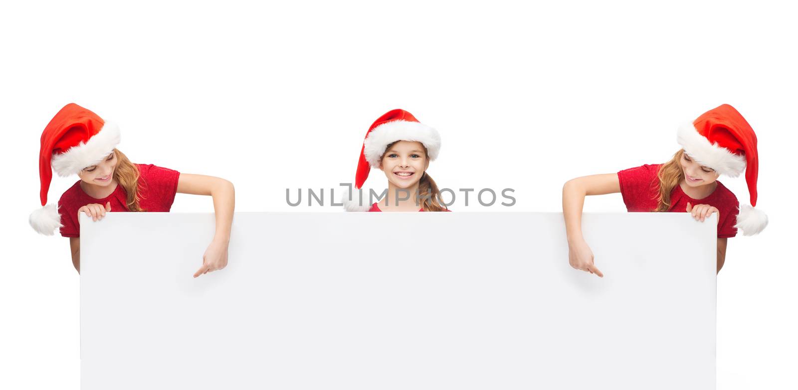 christmas, x-mas, people, advertisement, sale concept - girlsn in santa helper hats with blank white board