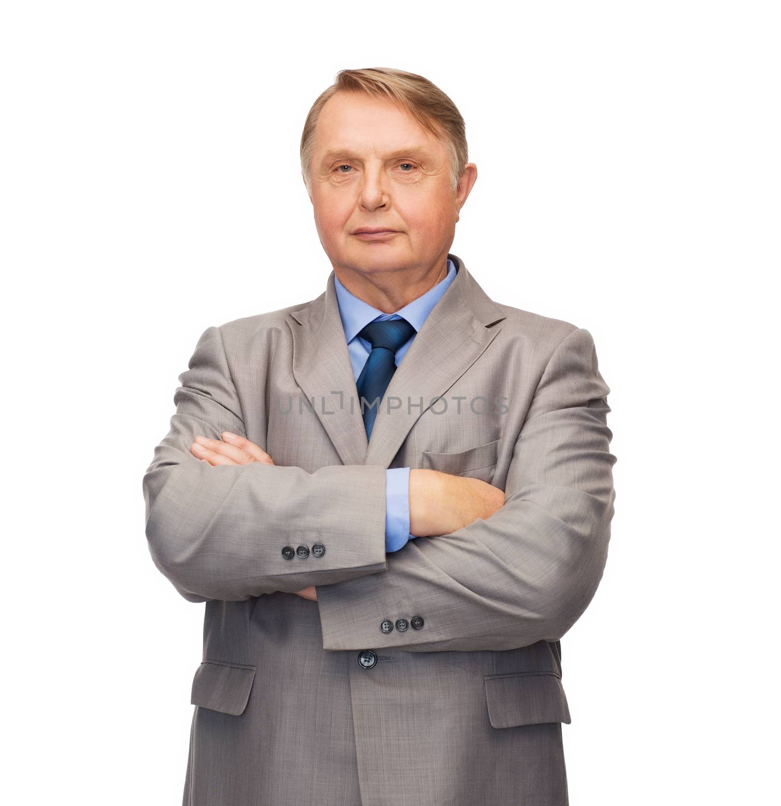 serious businessman or teacher in suit by dolgachov