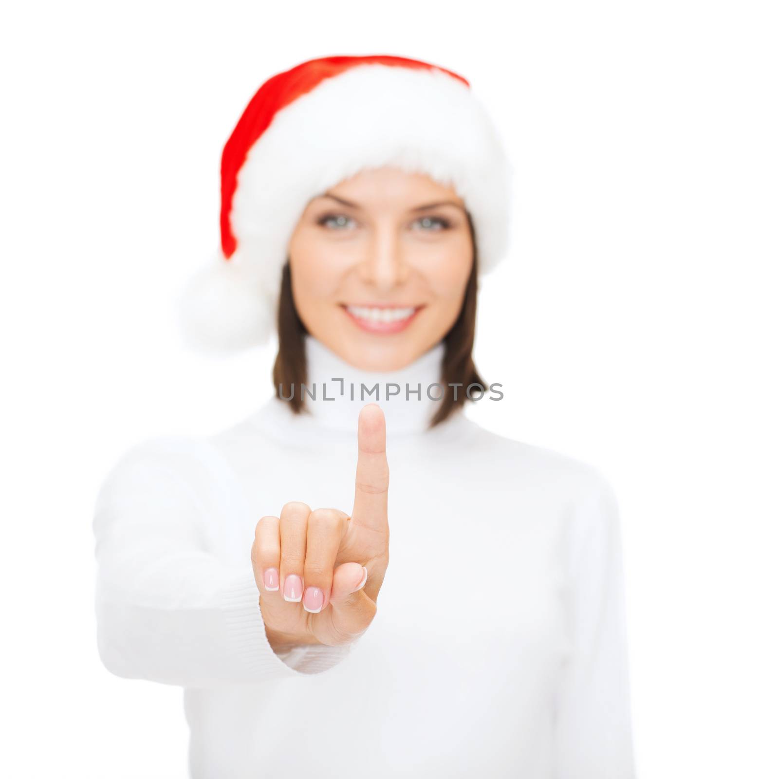 christmas, x-mas, winter, happiness and technology concept - smiling woman in santa helper hat pressing vitrual button