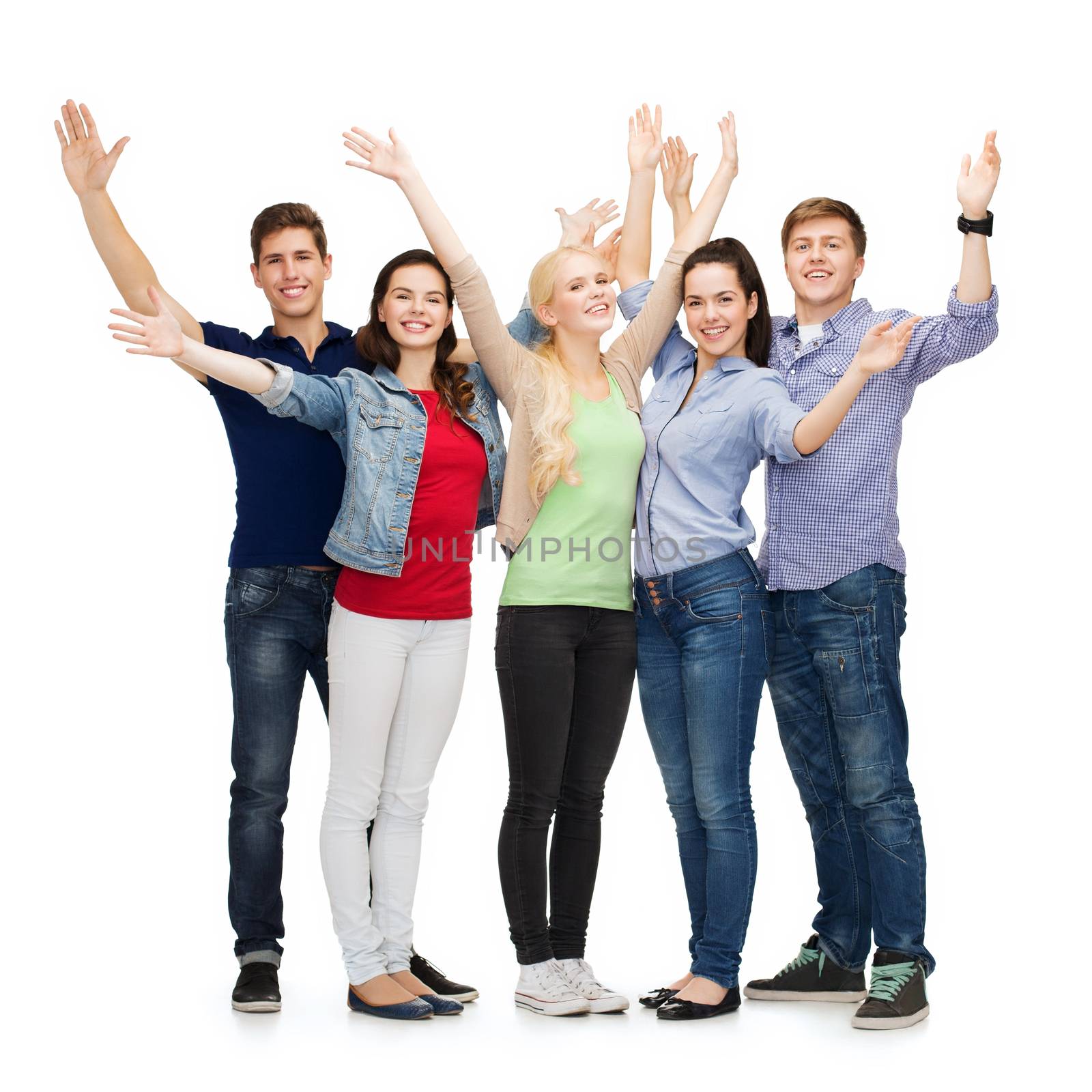 education and people concept - group of smiling students standing and waving hands