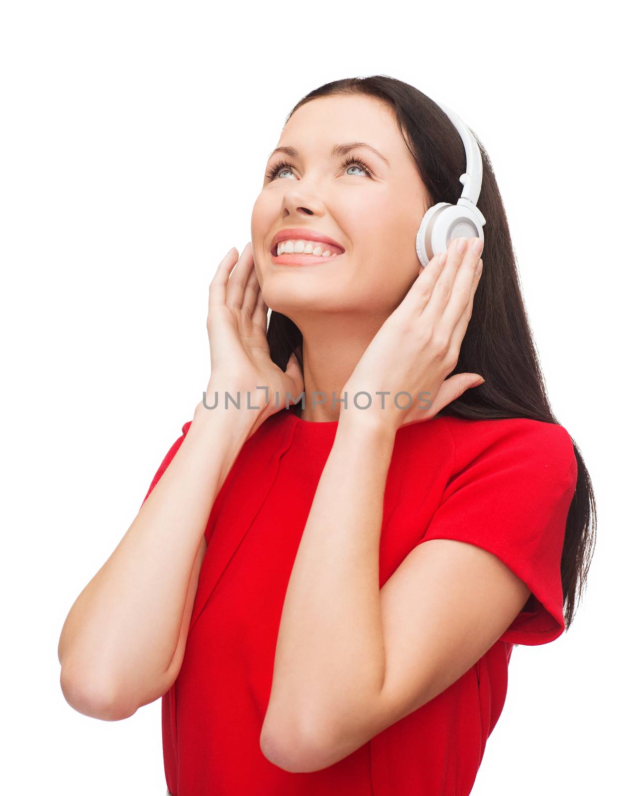 music and technology concept - smiling young woman with headphones