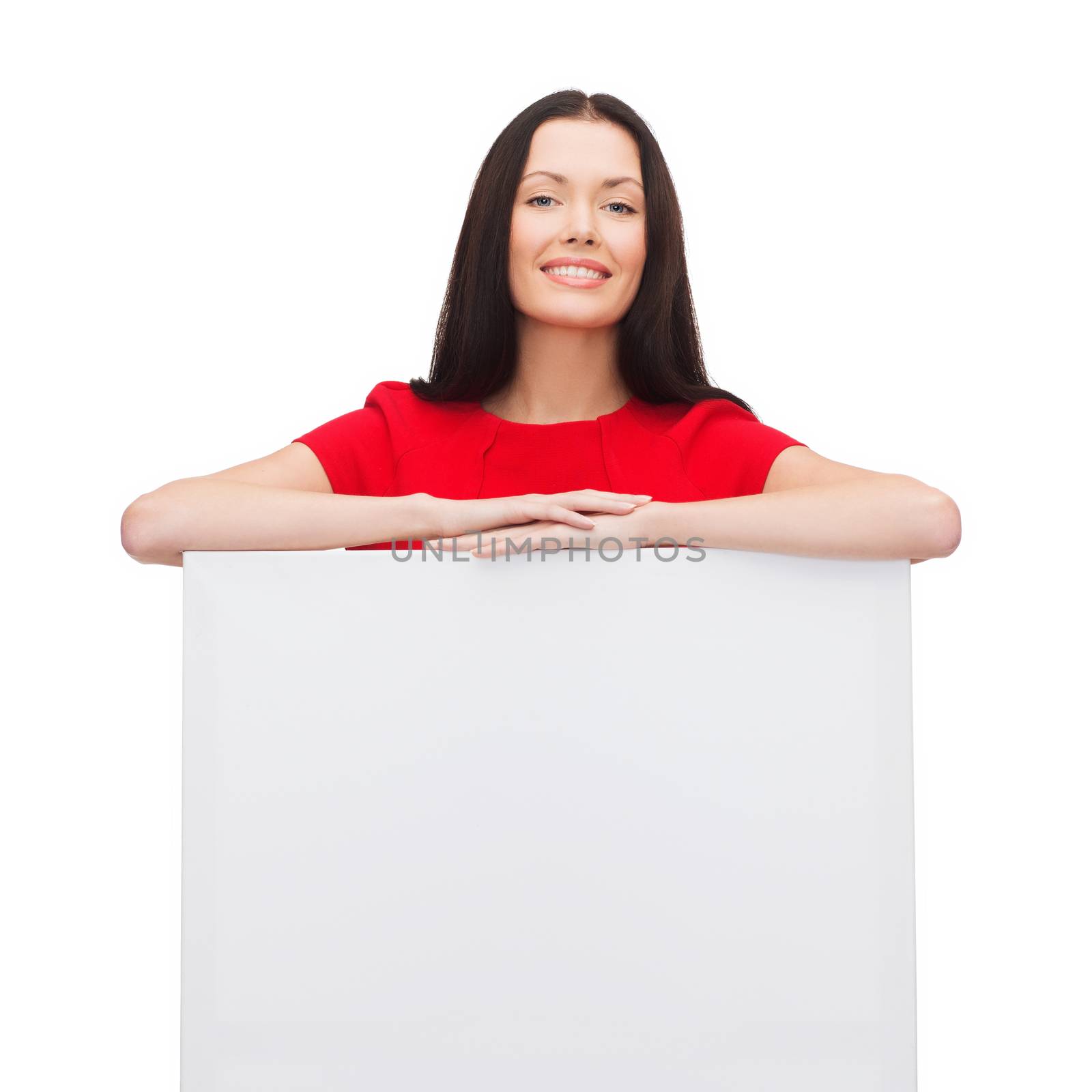 smiling young woman with blank white board by dolgachov