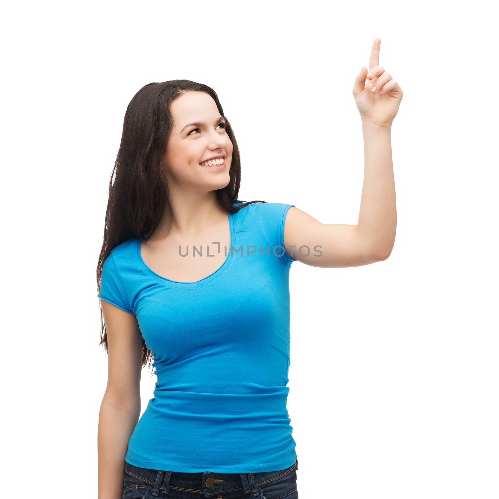 advertisement concept - attractive teenager in casual clothes pointing her finger up