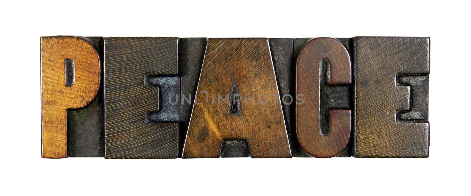 The word PEACE written in vintage letterpress type