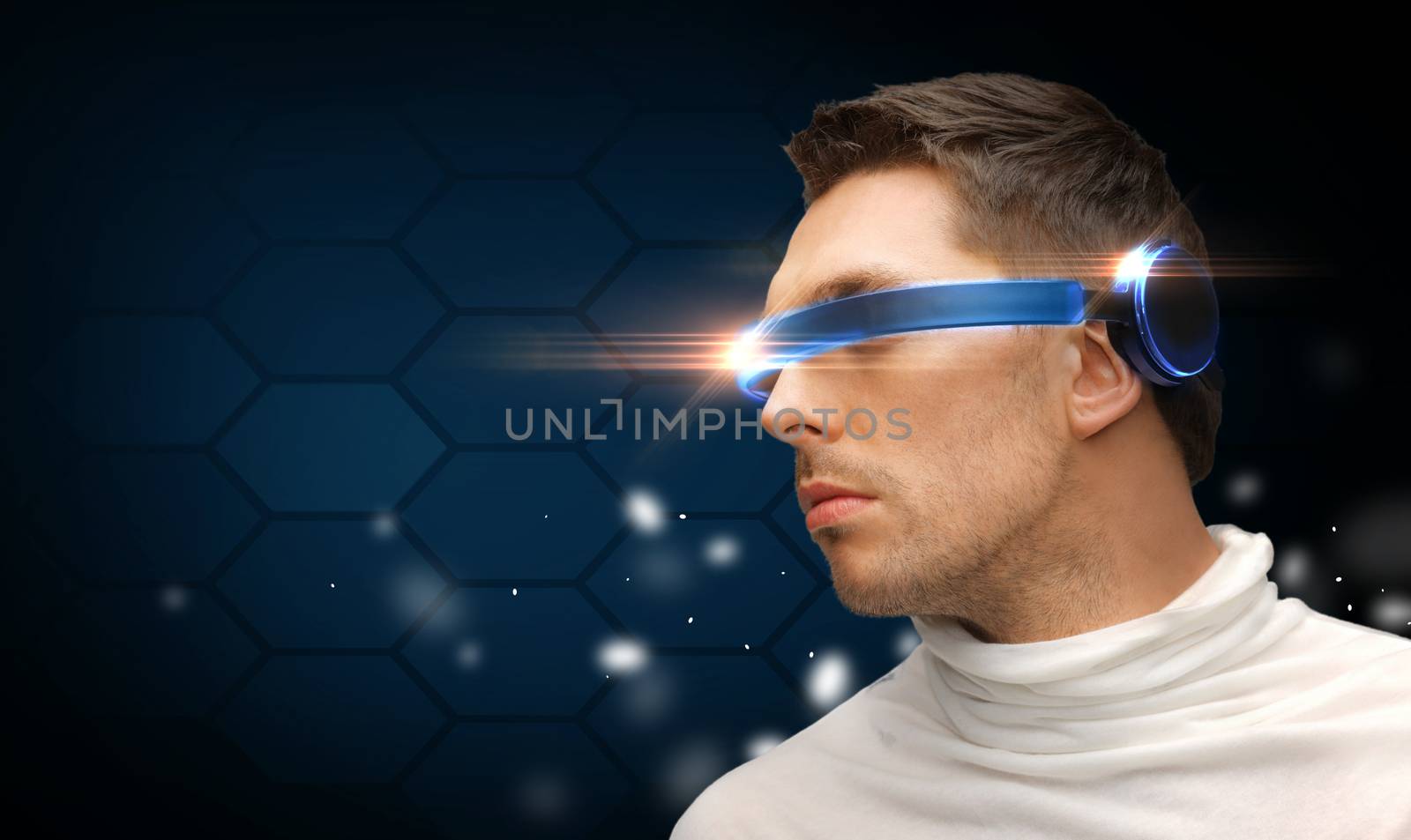 future technology concept - handsome man with futuristic glasses