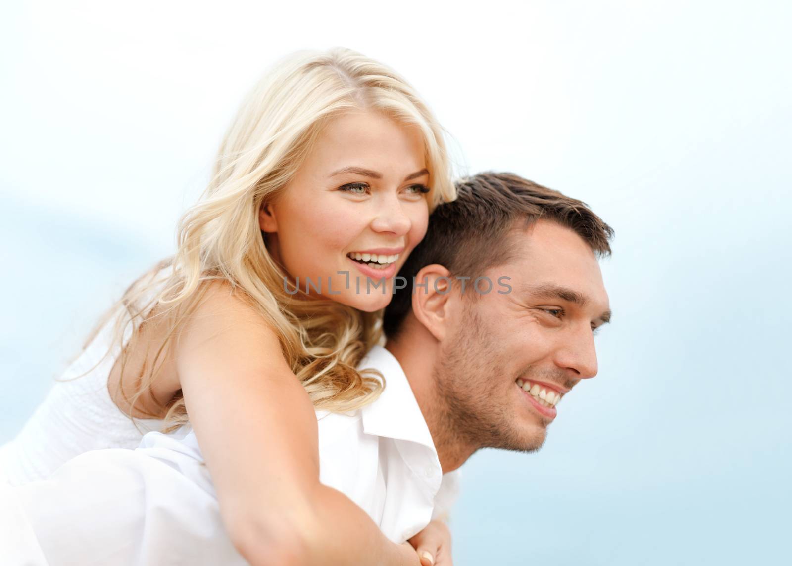 summer holidays, celebration and dating concept - couple at seaside