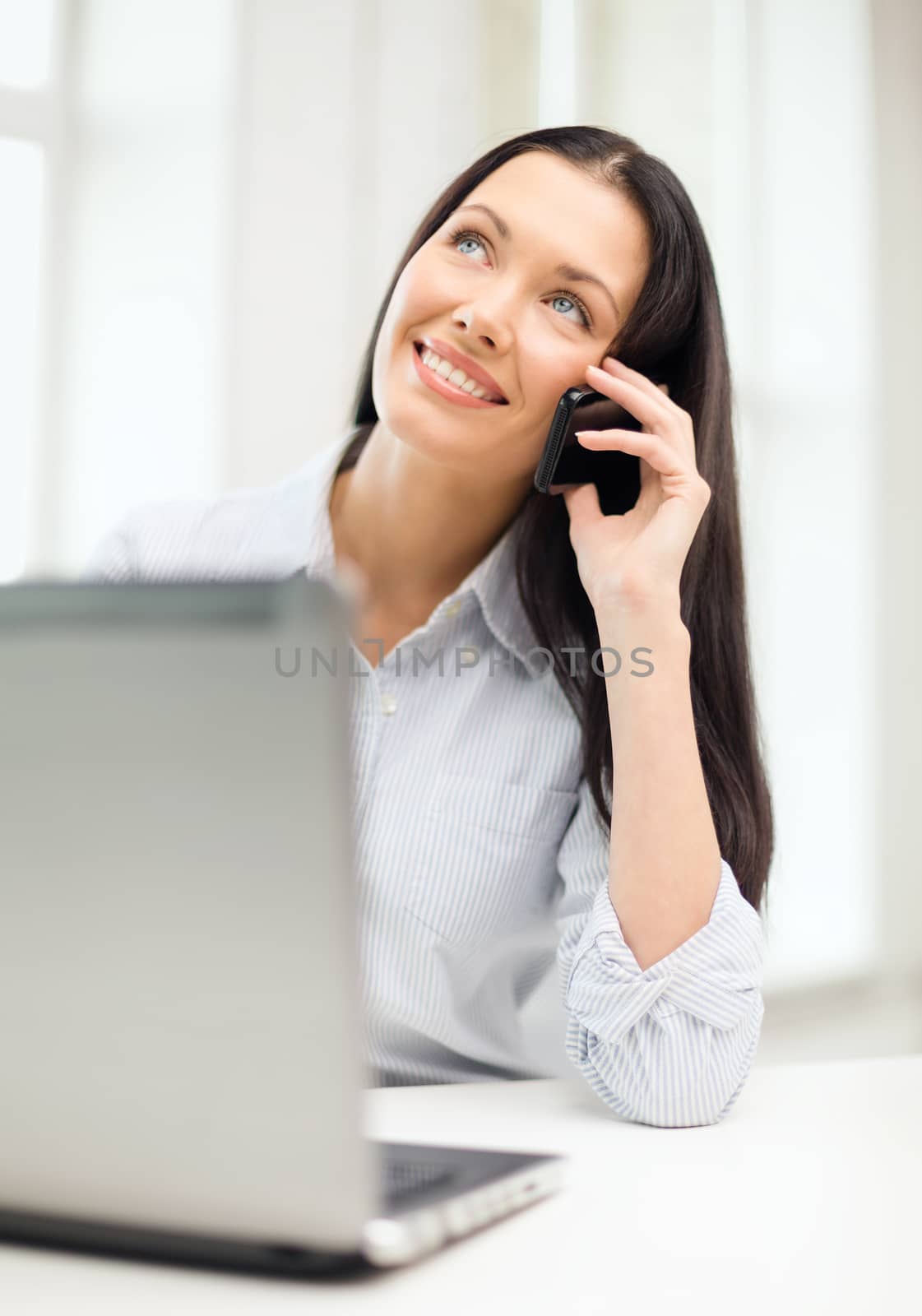education, business and technology concept - smiling businesswoman or student with laptop computer and smartphone
