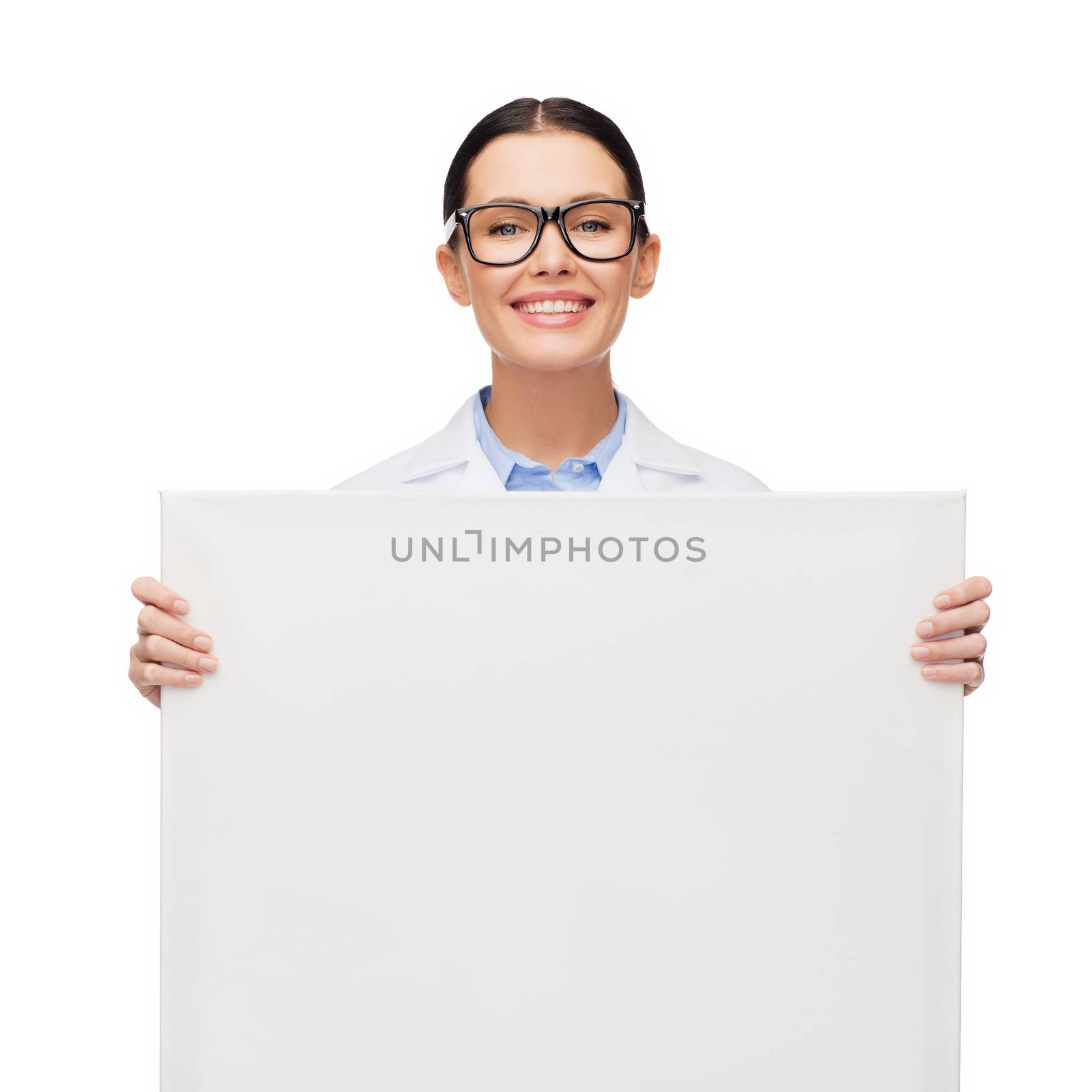 female doctor in eyeglasses with white blank board by dolgachov