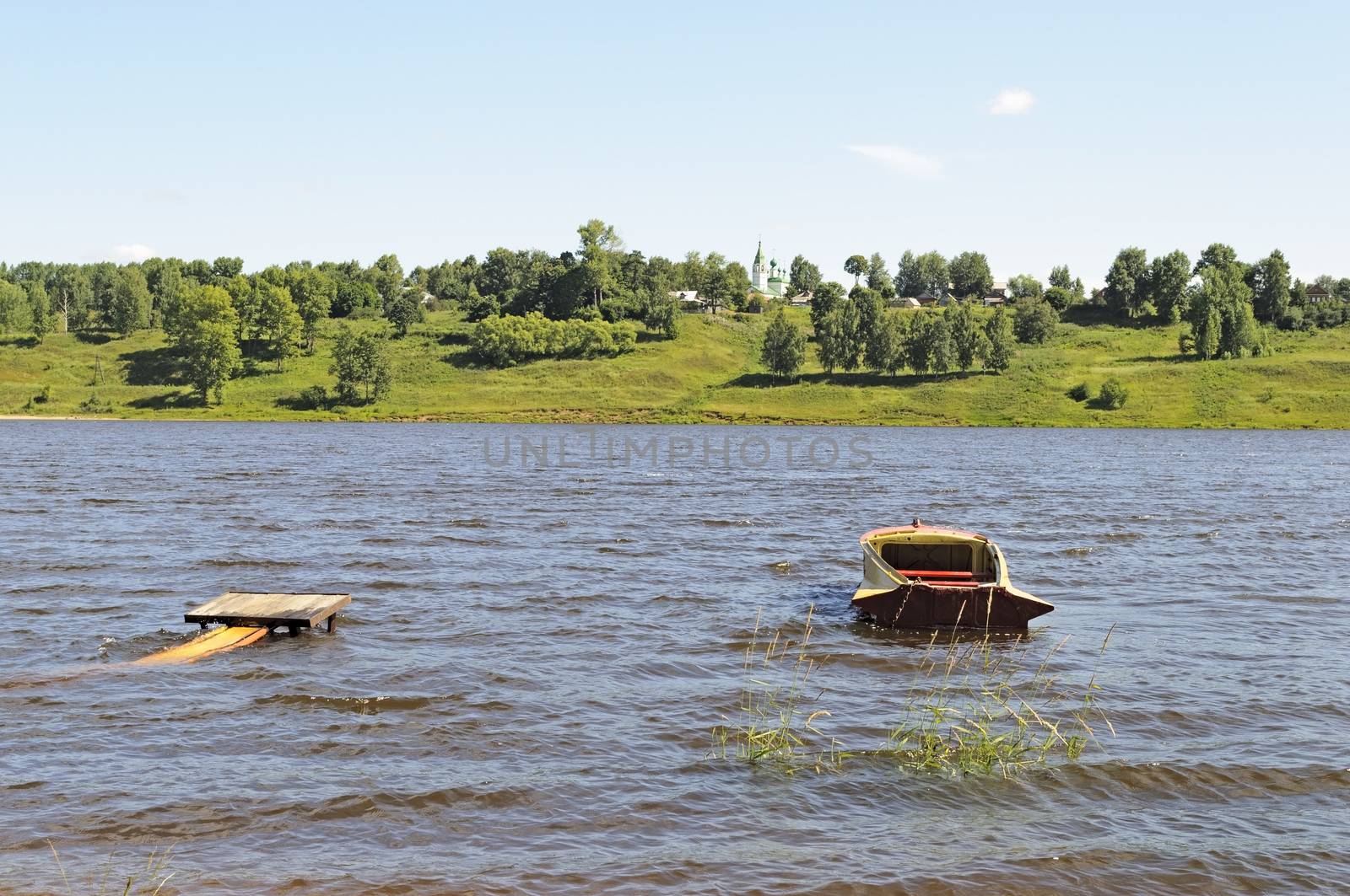 Boat near the bank of the Volga river in Tutaev, Russia
