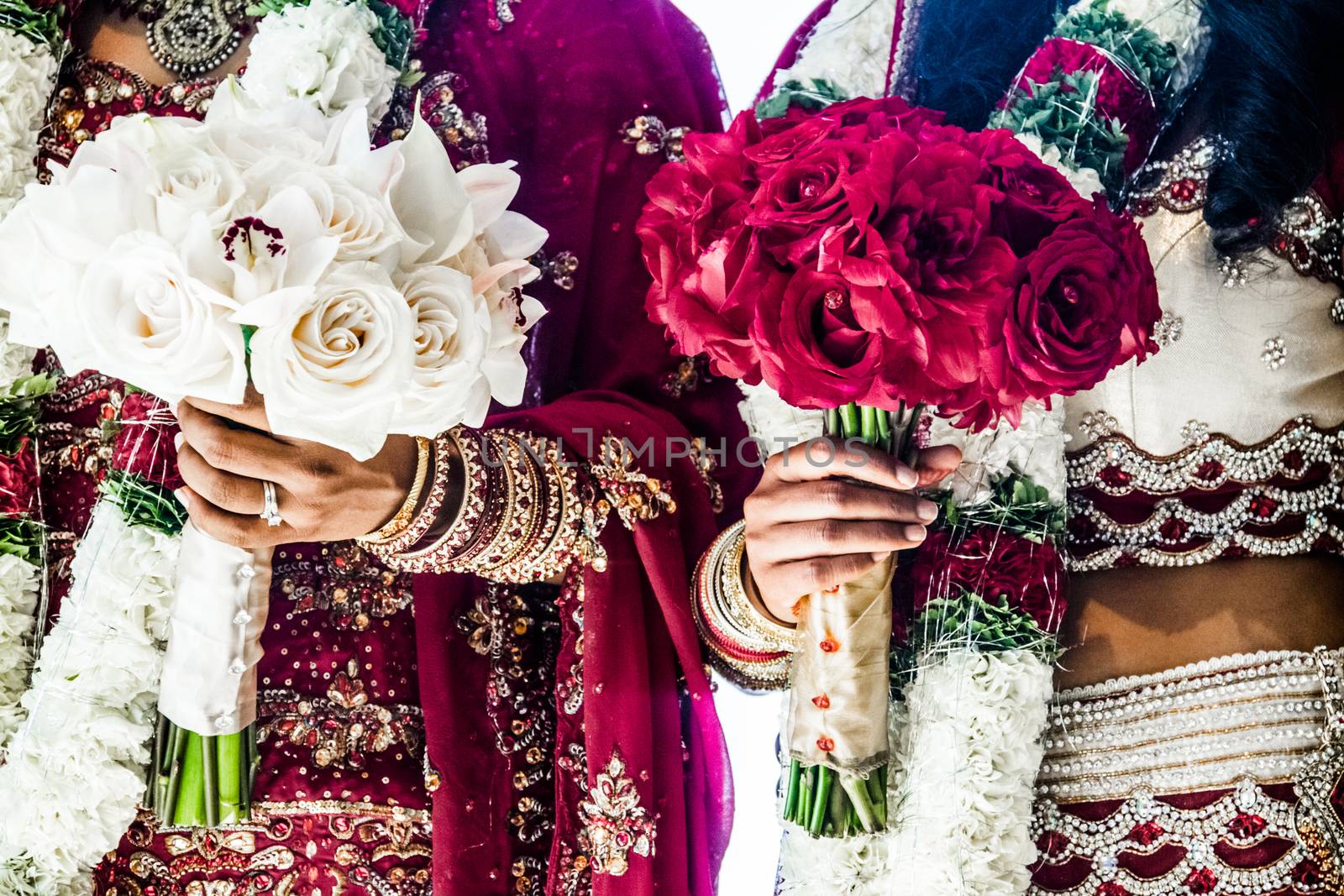 Red and White Traditional Indian Wedding Bouquets and brides