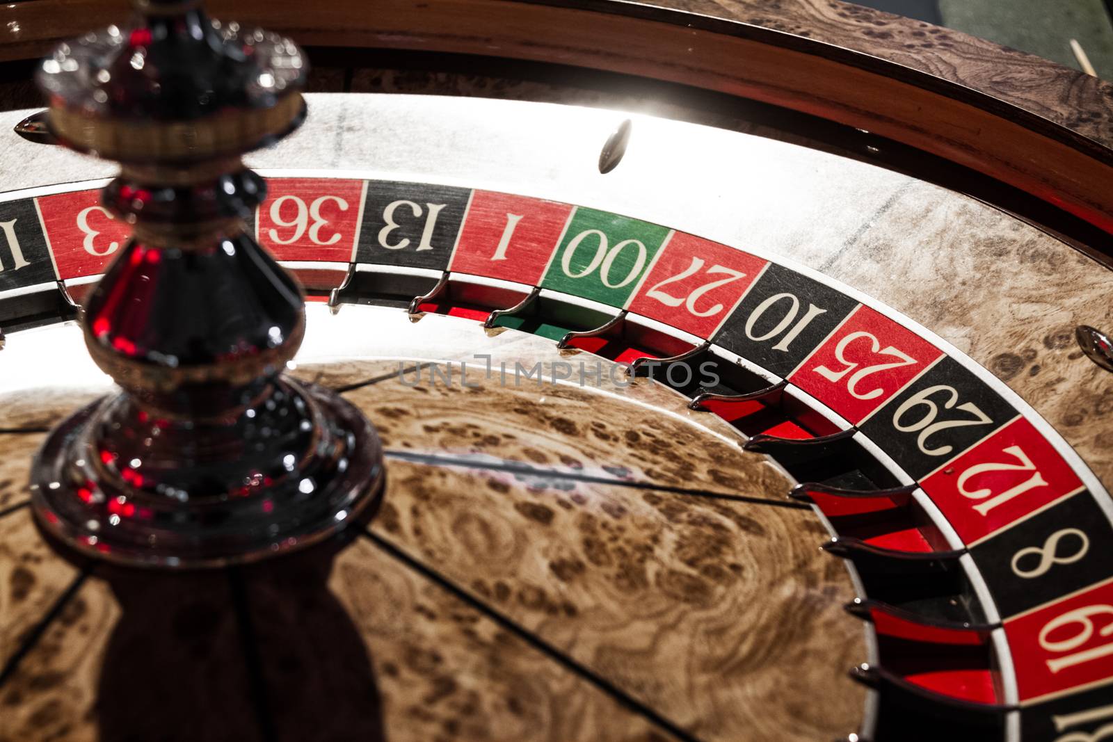 Wooden Shiny Roulette Details in a Casino by aetb