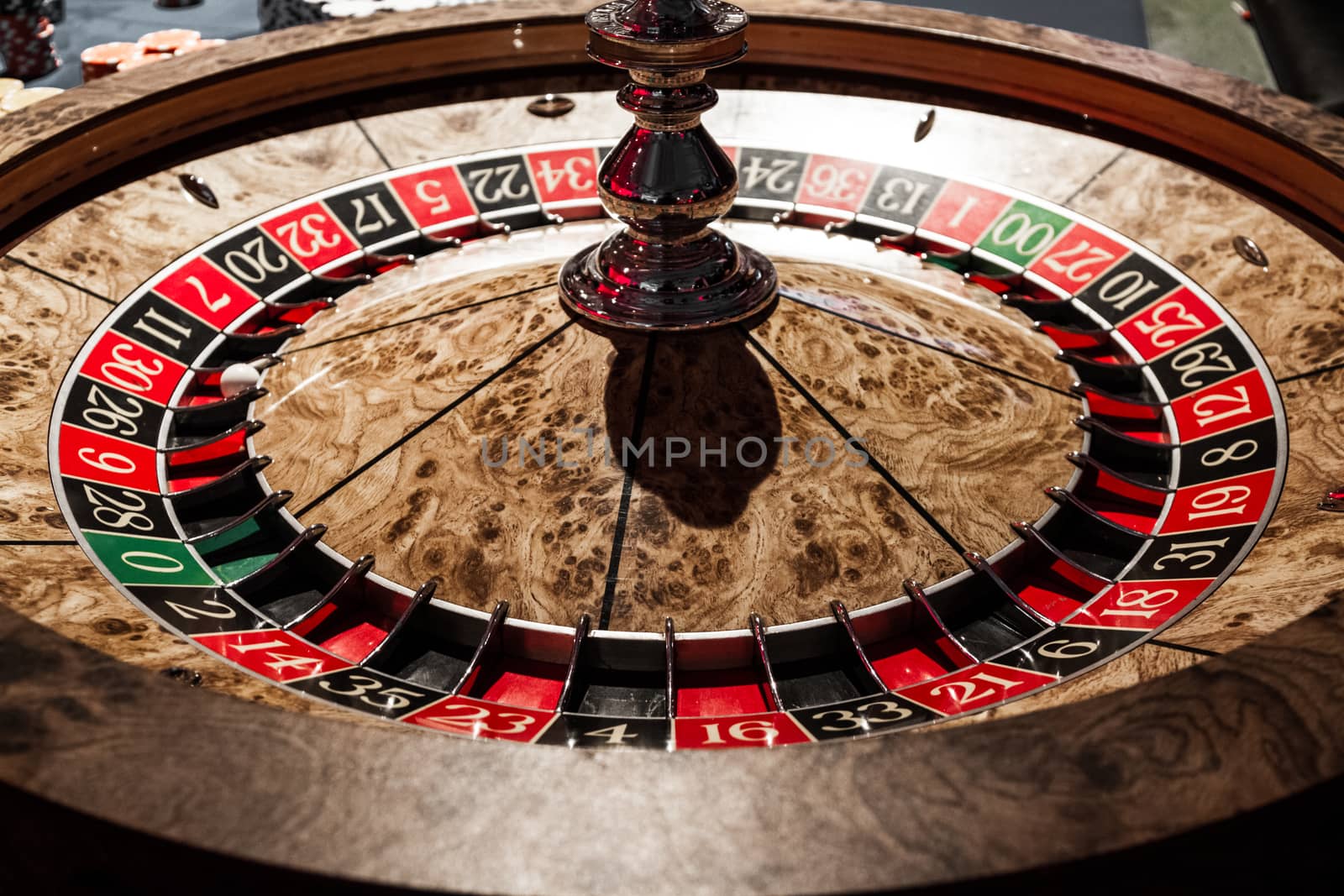 Wooden Shiny Roulette Details in a Casino by aetb