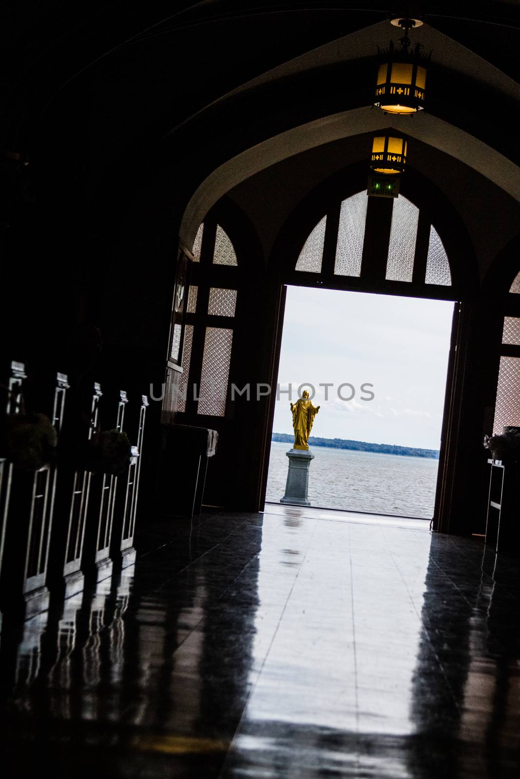 Interior of a Church in Silhouette with Jesus Statue Outdoor