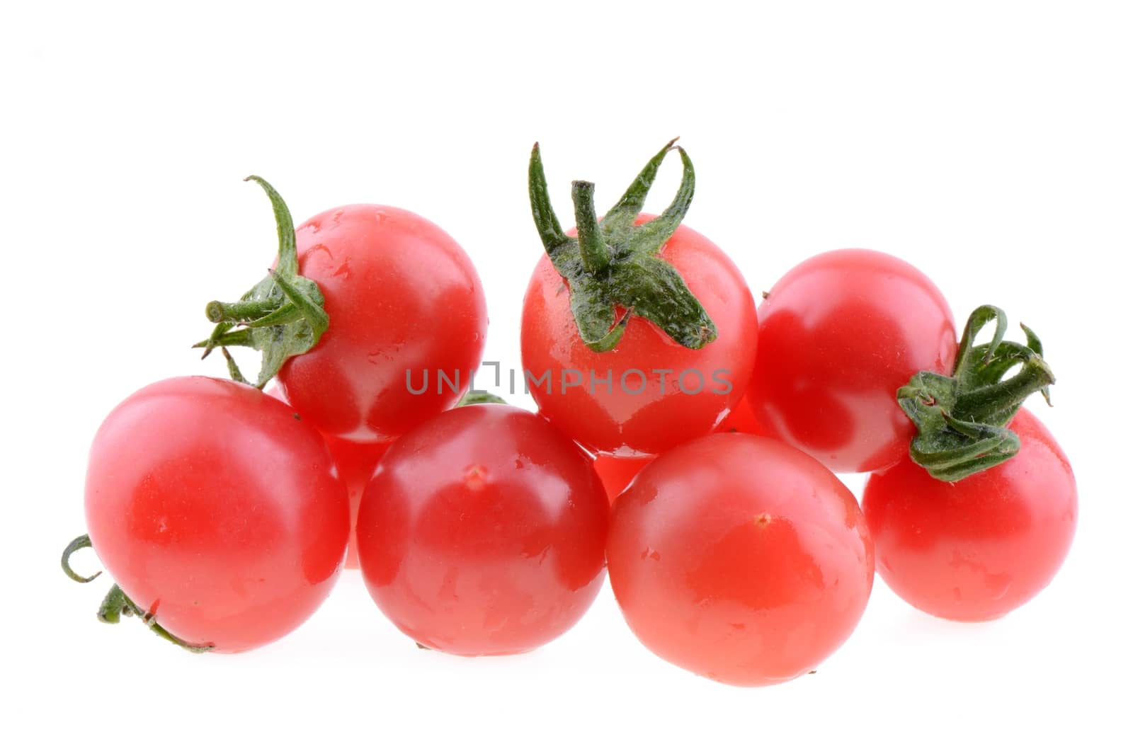 Cherry tomato fruits on a white background