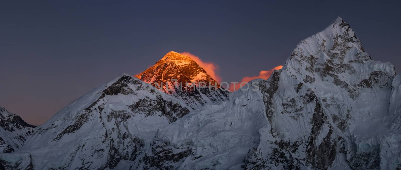 Everest Summit panoramic view Nutpse at sunset by Arsgera