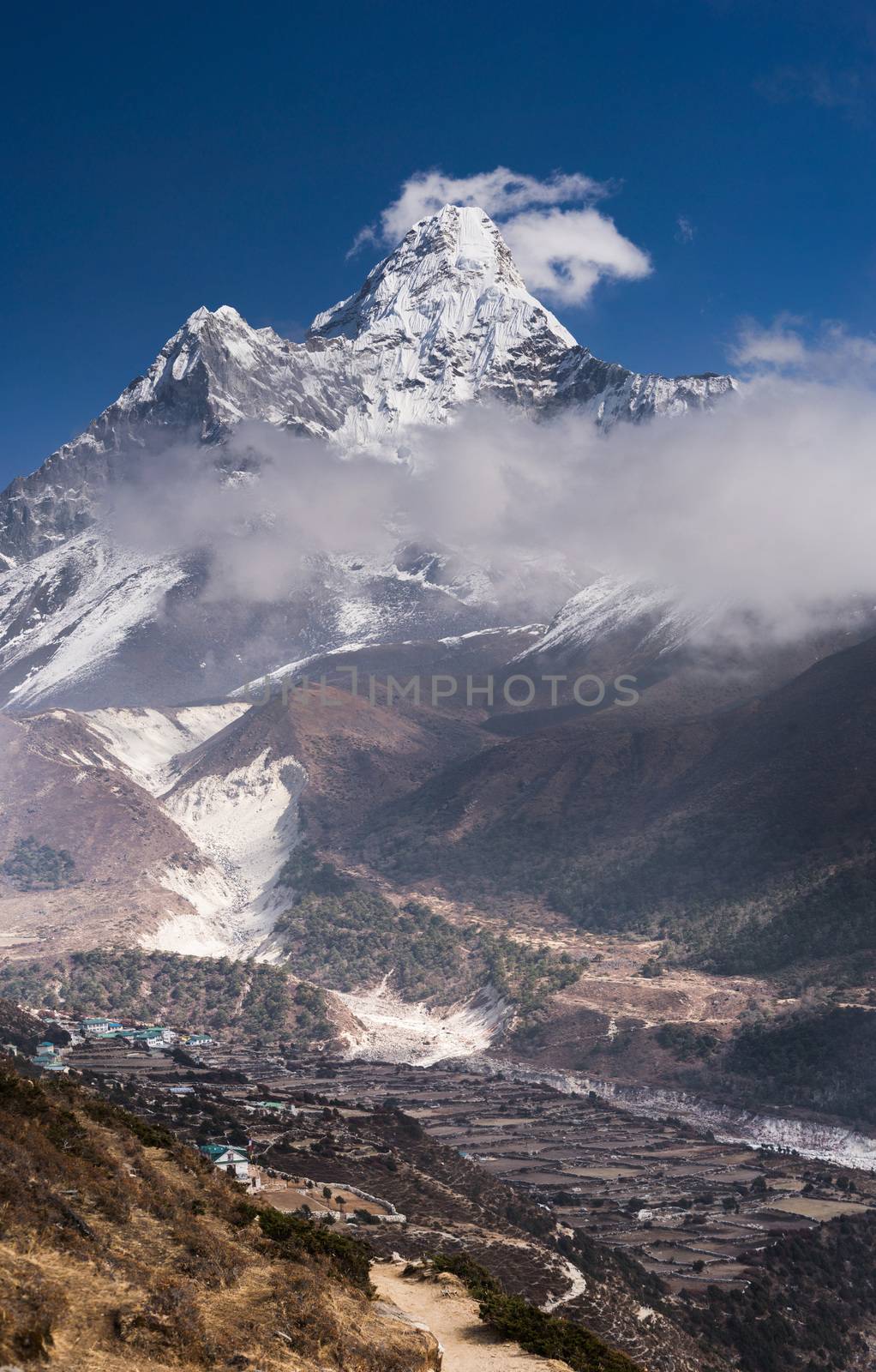 Vertical panoramic view of Ama Dablam (Amadablam) peak and himalaya village