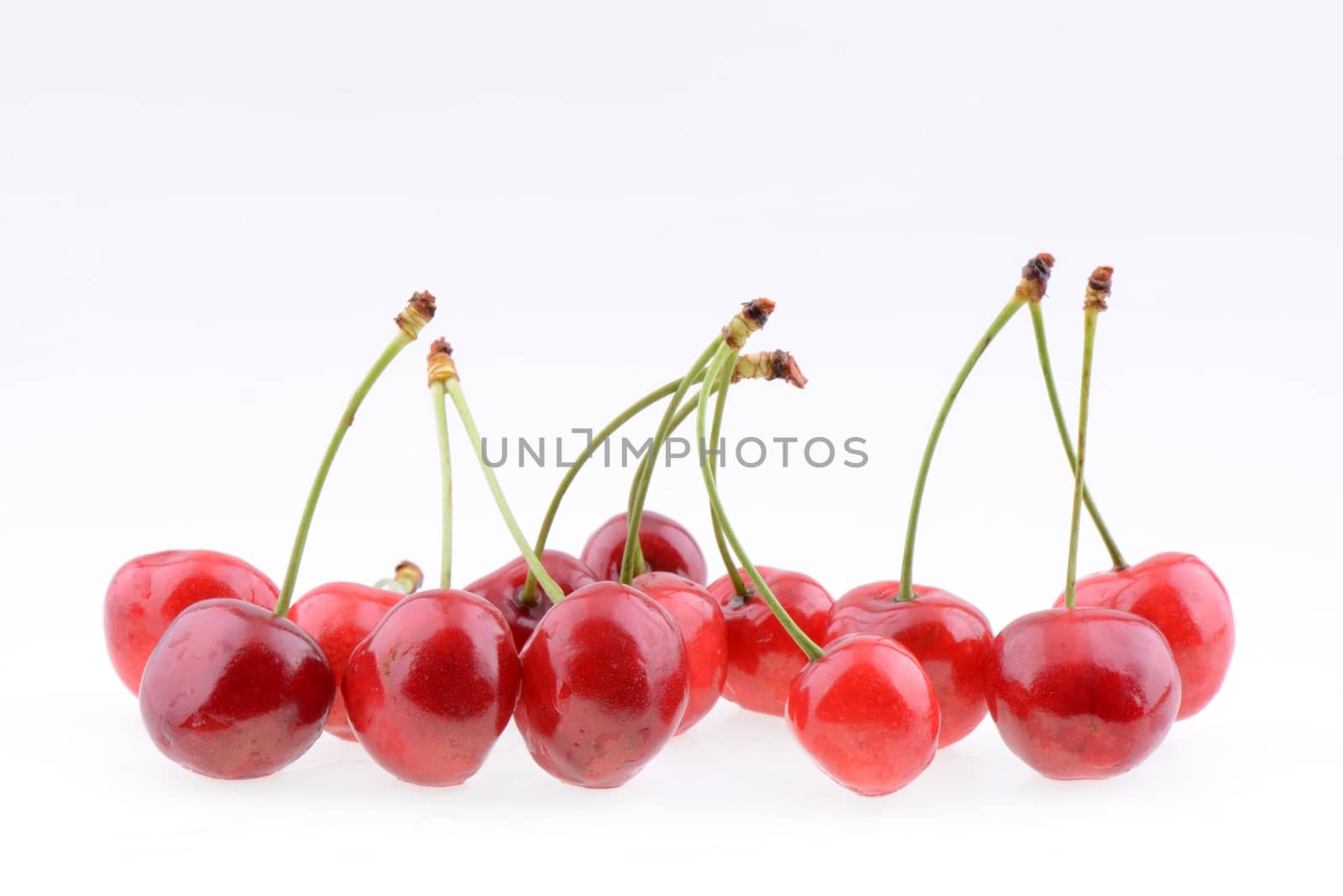 Sweet red cherries isolated on a white background