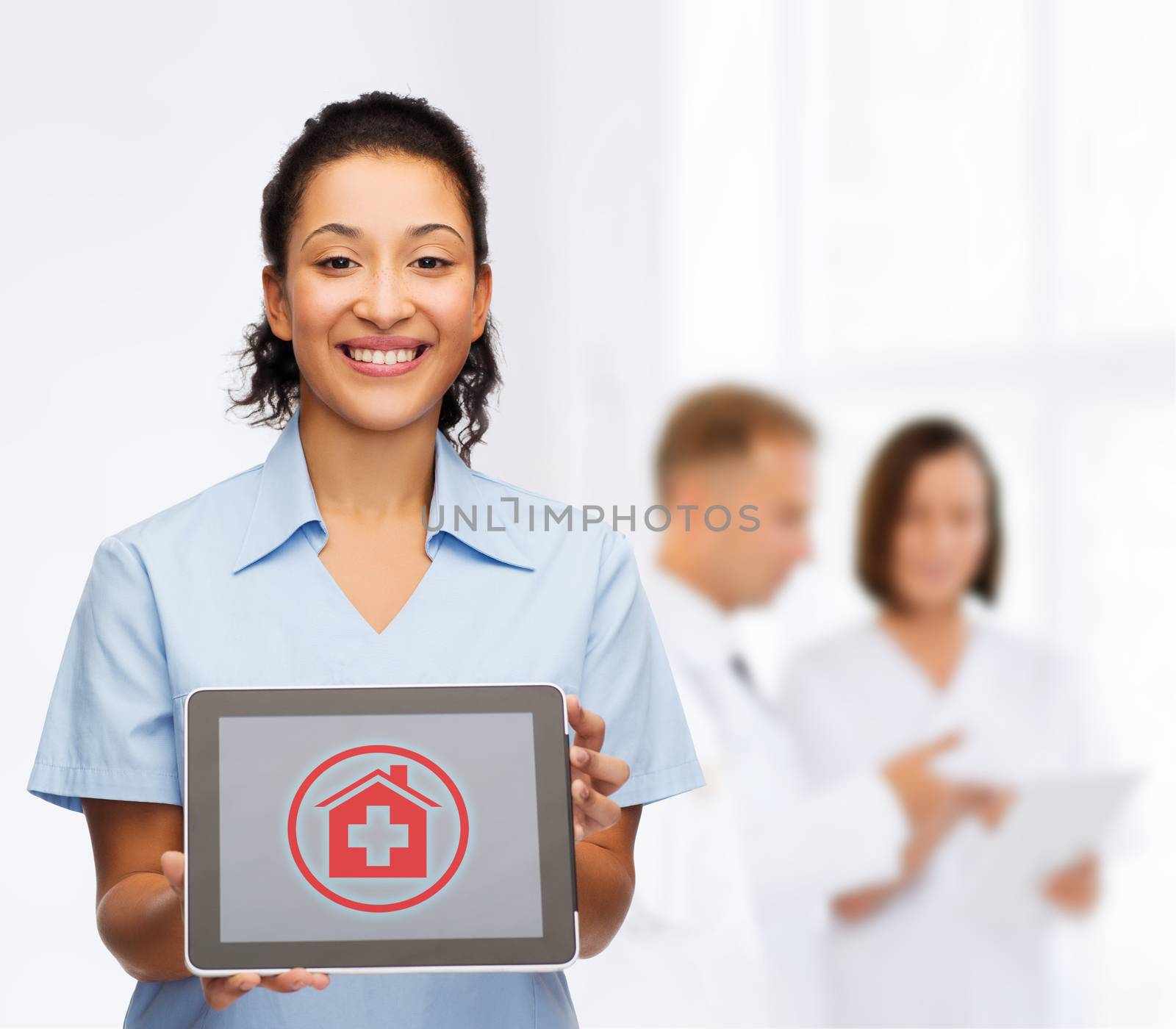 healthcare, medicine and technology concept - smiling african american female doctor or nurse with tablet pc computer