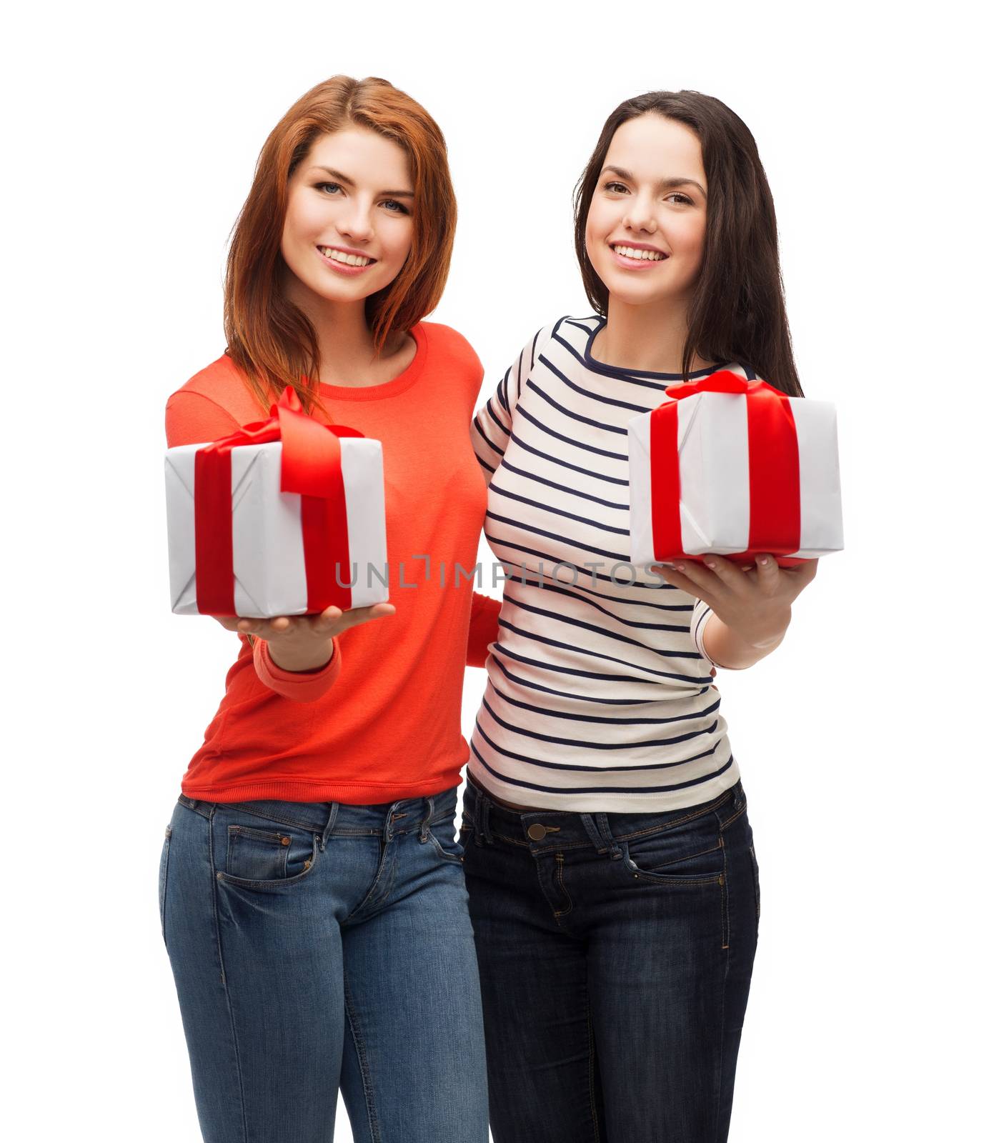 two smiling teenage girls with presents by dolgachov