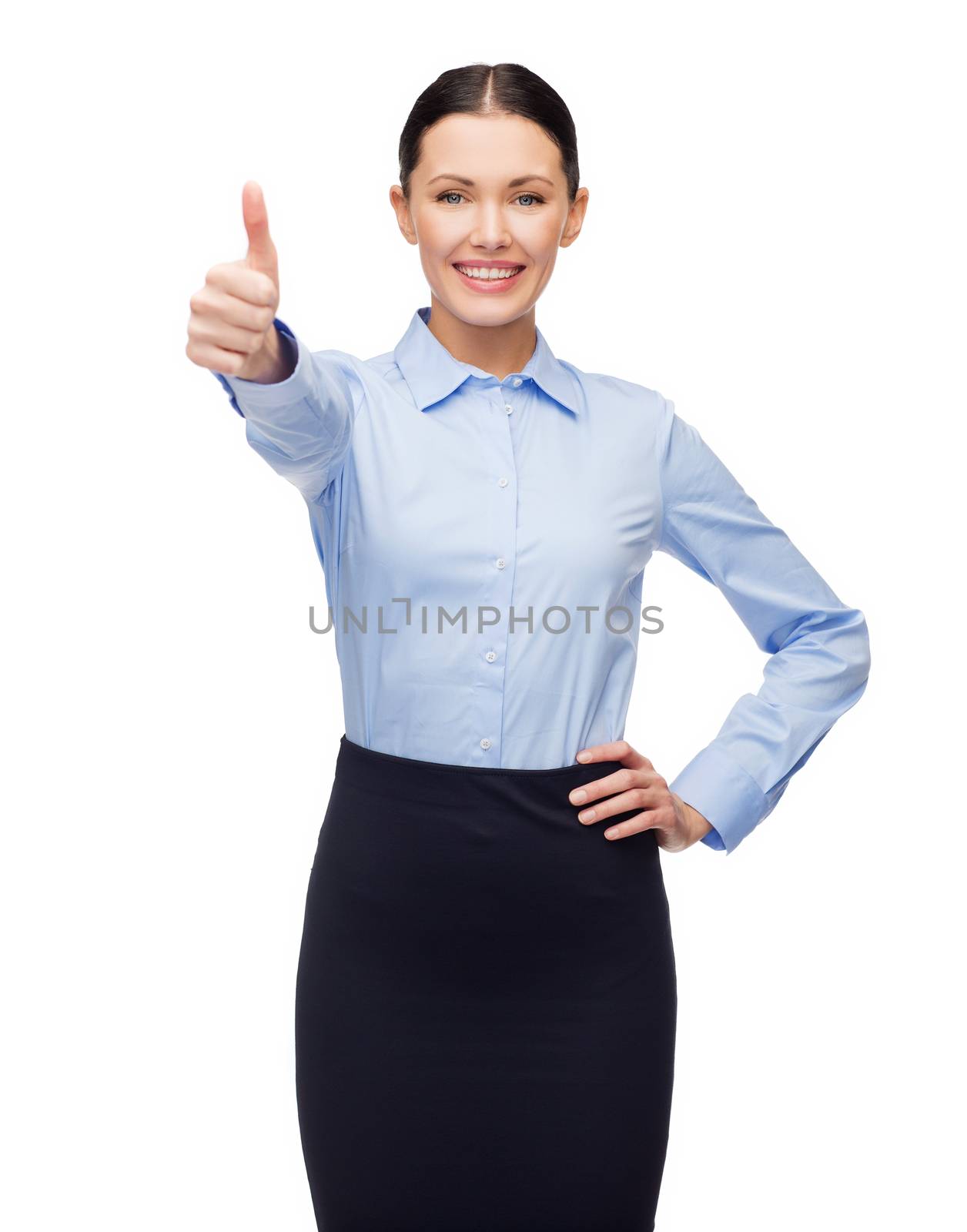 business and education concept - friendly young smiling businesswoman showing thumbs up