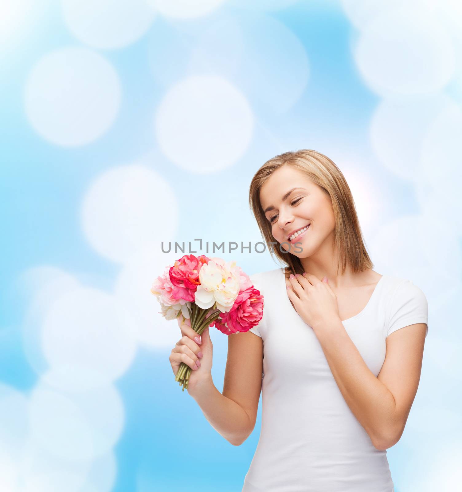 smiling woman with bouquet of flowers by dolgachov