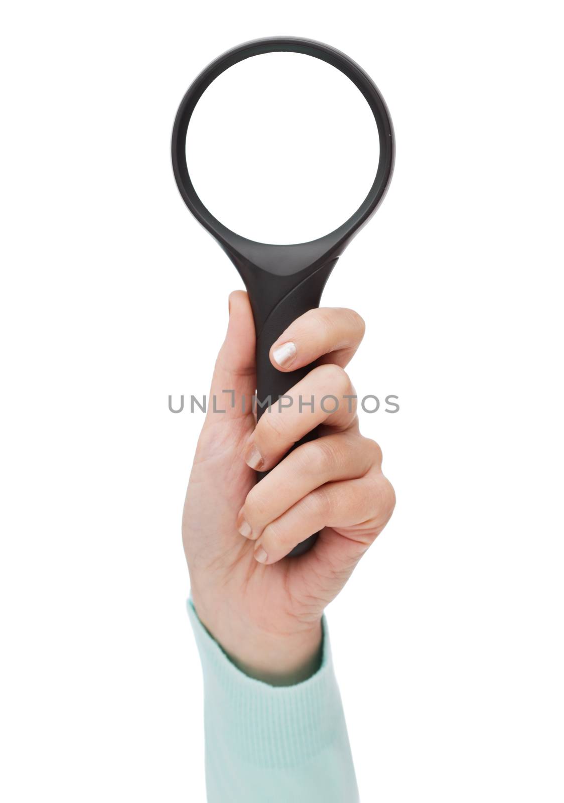 woman hand holding magnifying glass by dolgachov