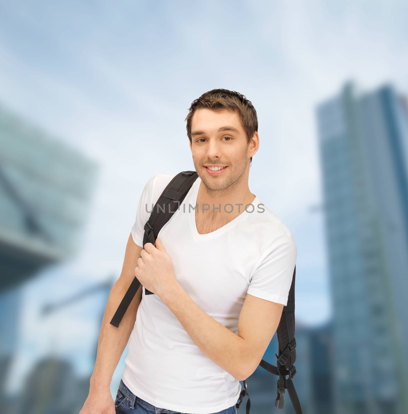 travelling student with backpack outdoor by dolgachov