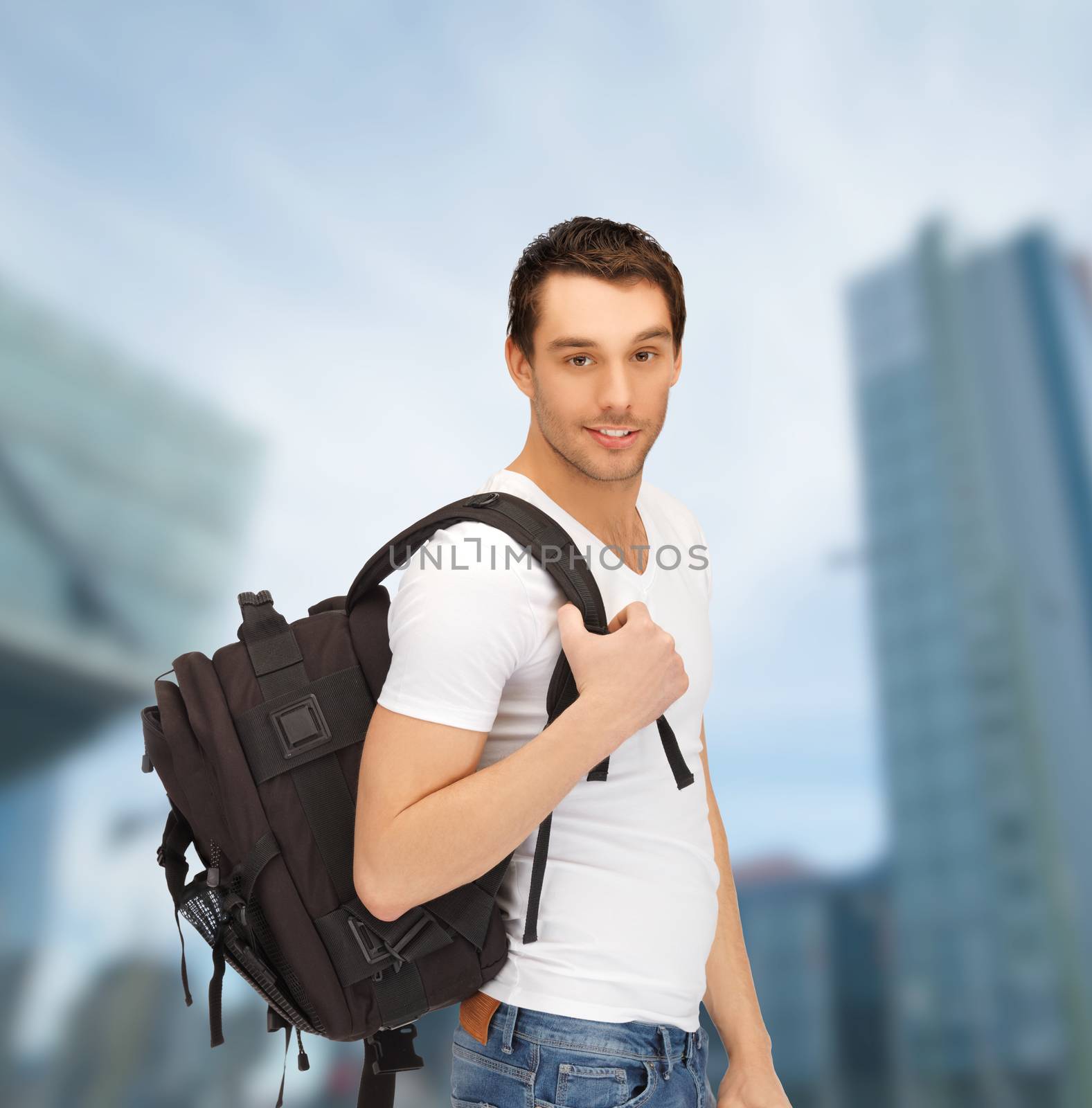 travelling student with backpack outdoor by dolgachov