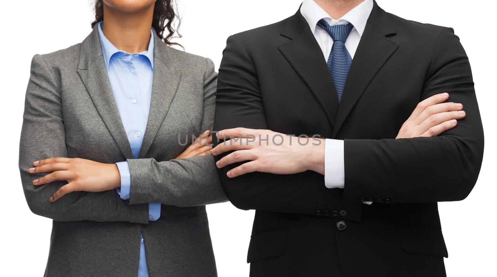 businesswoman and businessman with crossed arms by dolgachov