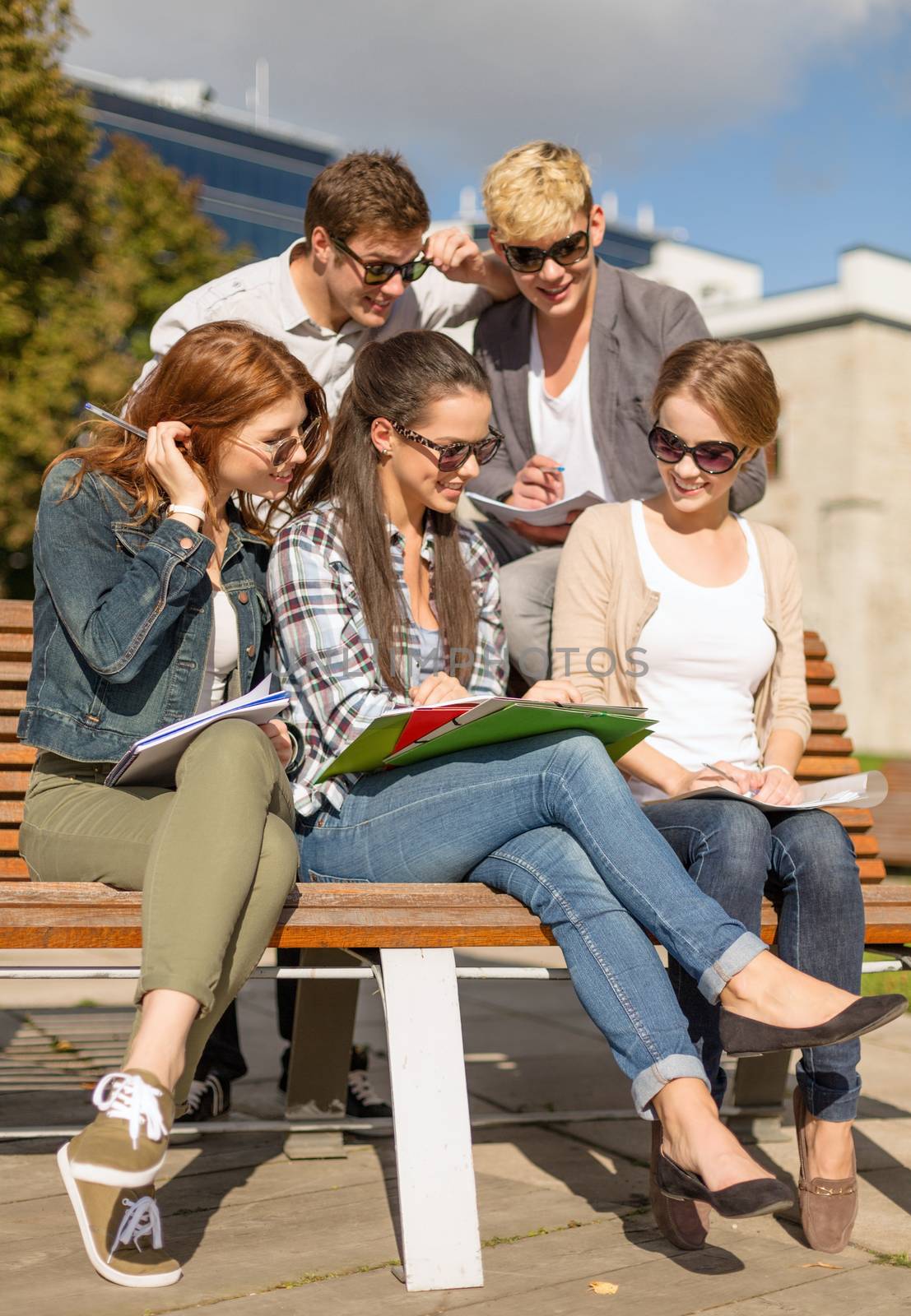 group of students or teenagers hanging out by dolgachov