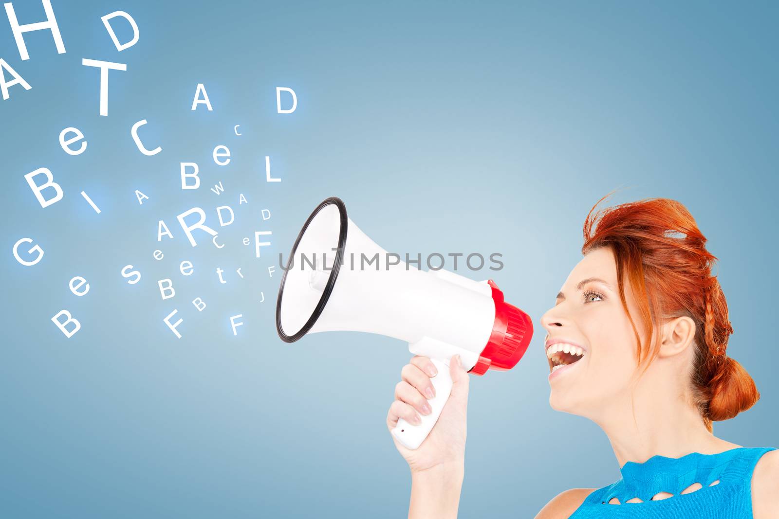 communication concept - redhead woman with megaphone over blue background