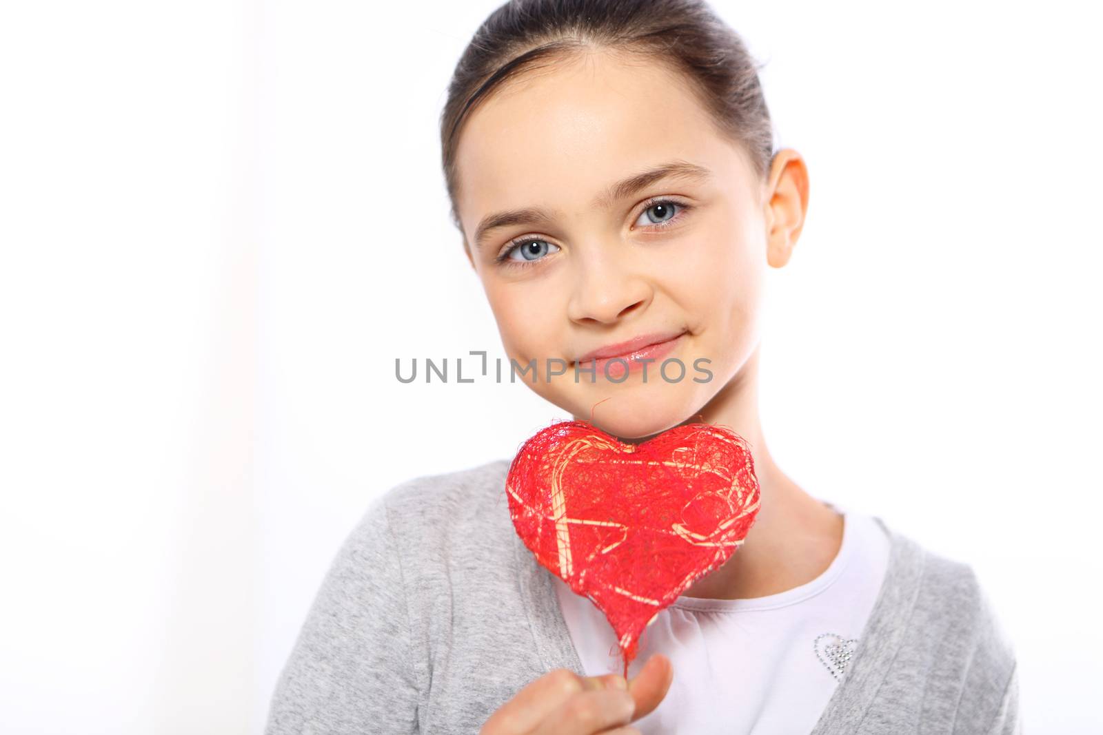 Caucasian girl with red Valentine heart
