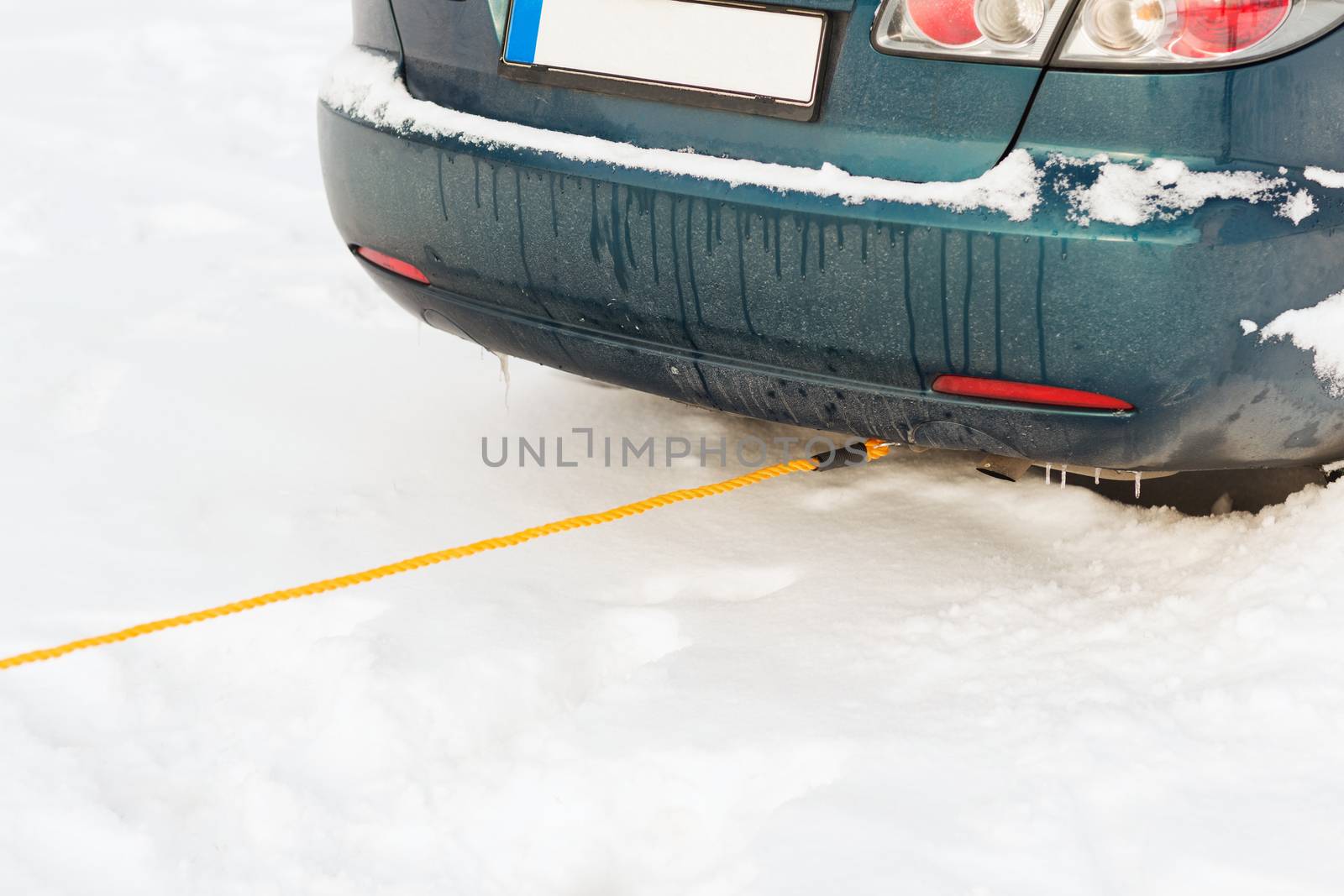 closeup of towing car with towing rope by dolgachov