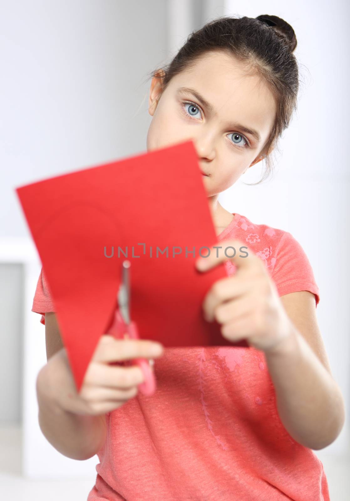 Caucasian girl with card for Valentine's Day or Mother's Day