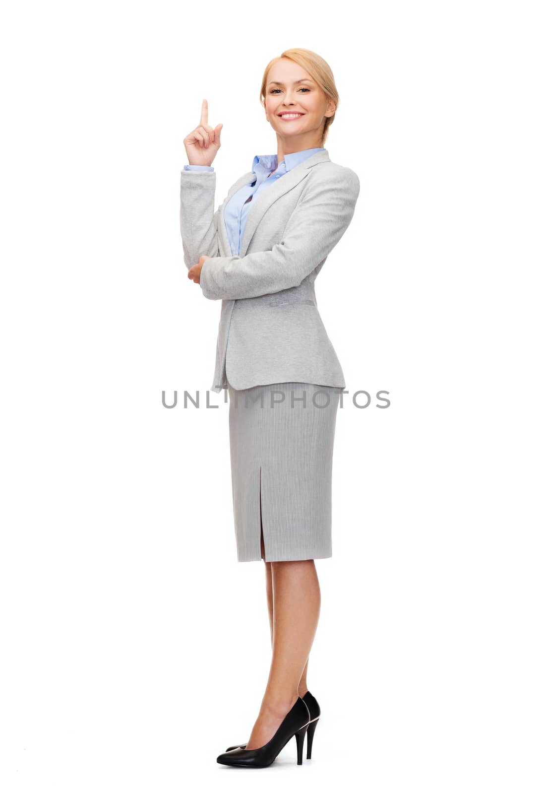 smiling businesswoman with her finger up by dolgachov