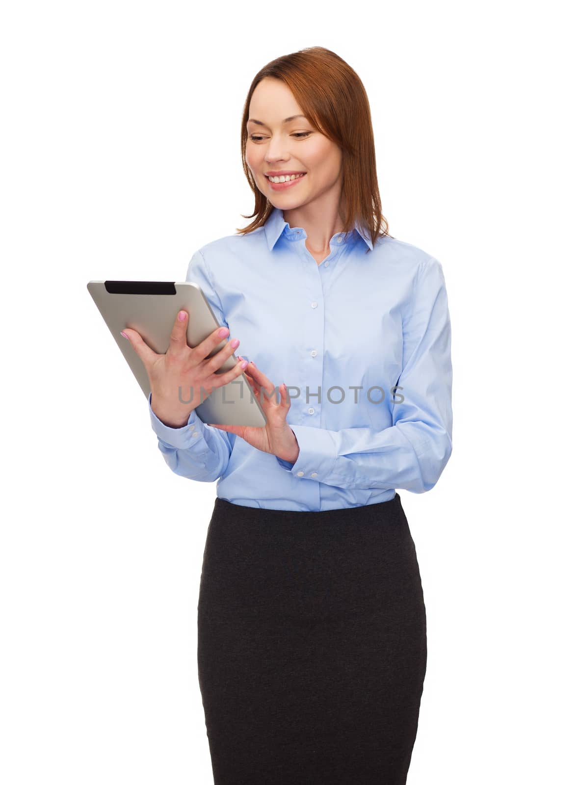 smiling woman looking at tablet pc by dolgachov