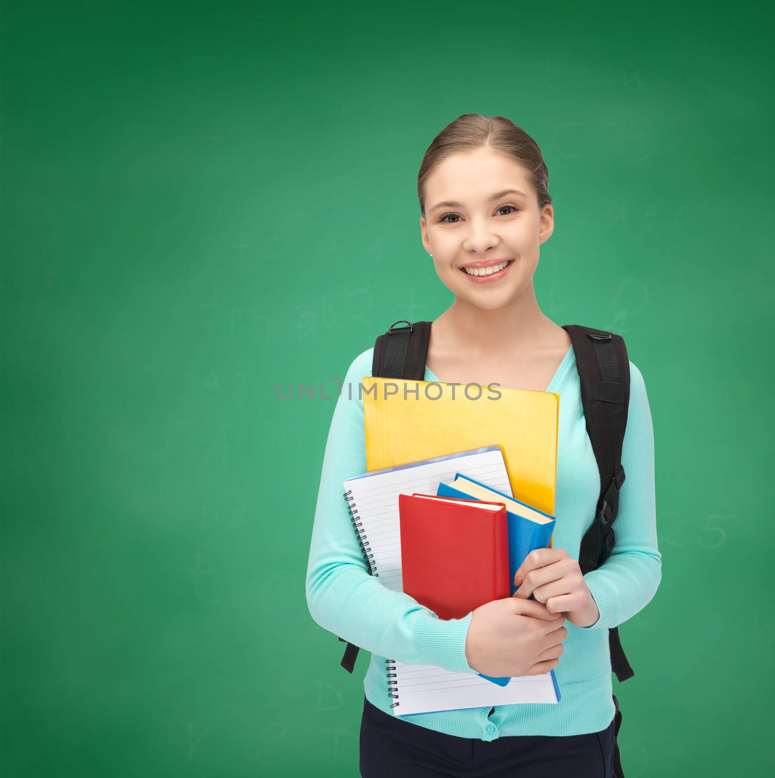 school and education concept - happy and smiling teenage girl with backpack, notebooks and books