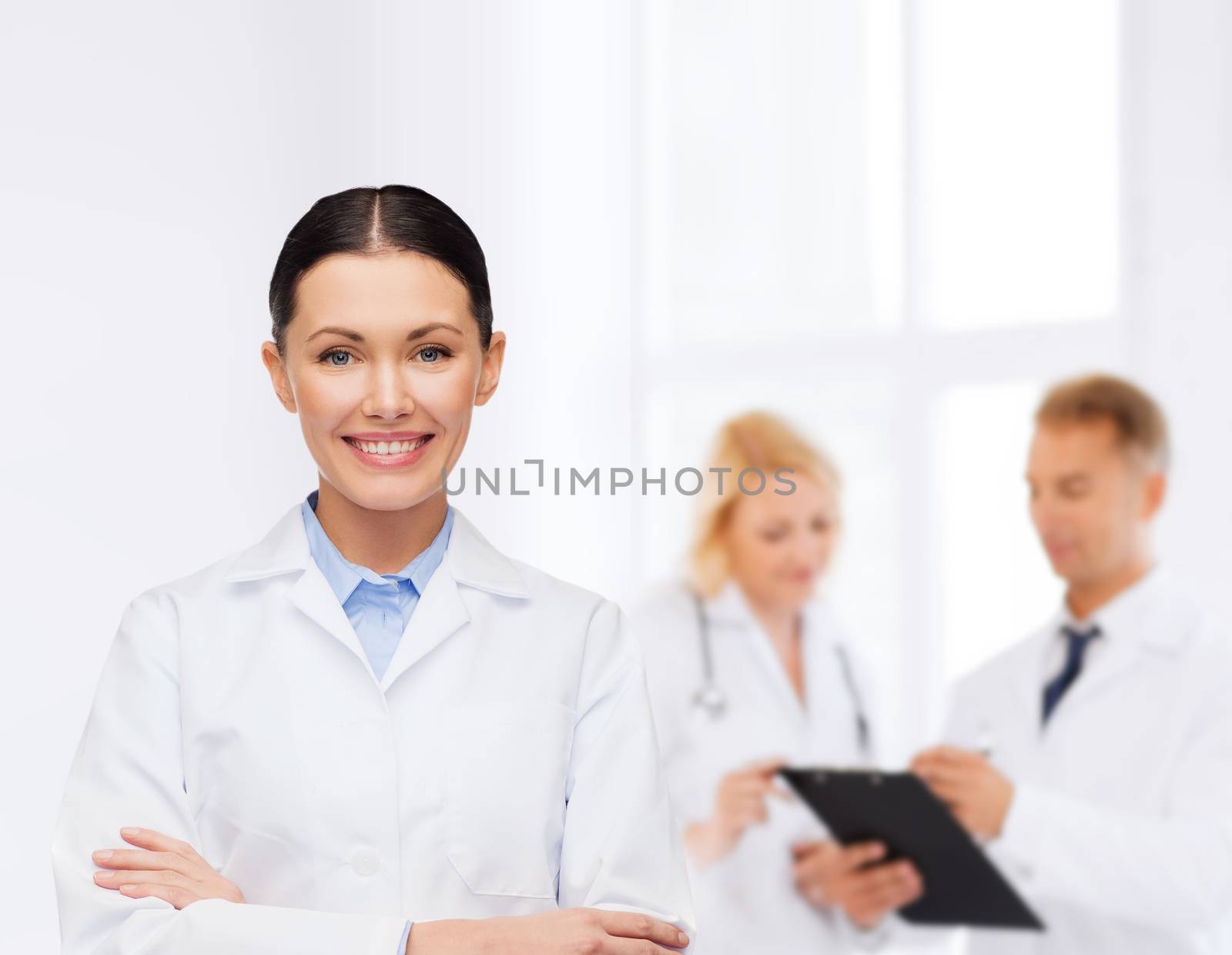 smiling female doctor by dolgachov