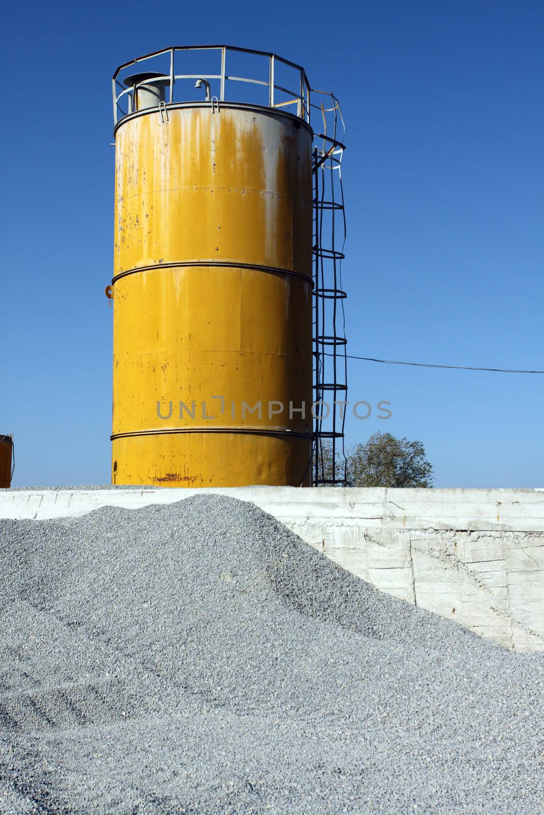 View of stone quarry with silos