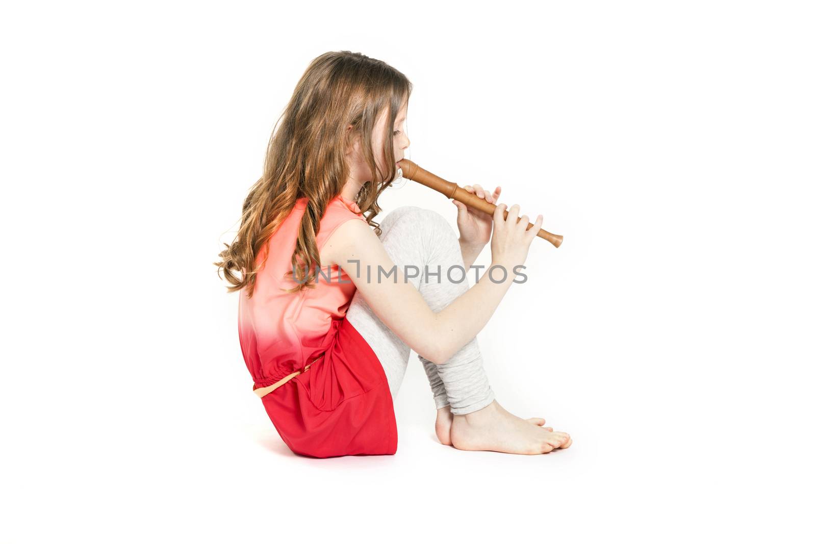 young girl sitting with soprano recorder by ahavelaar