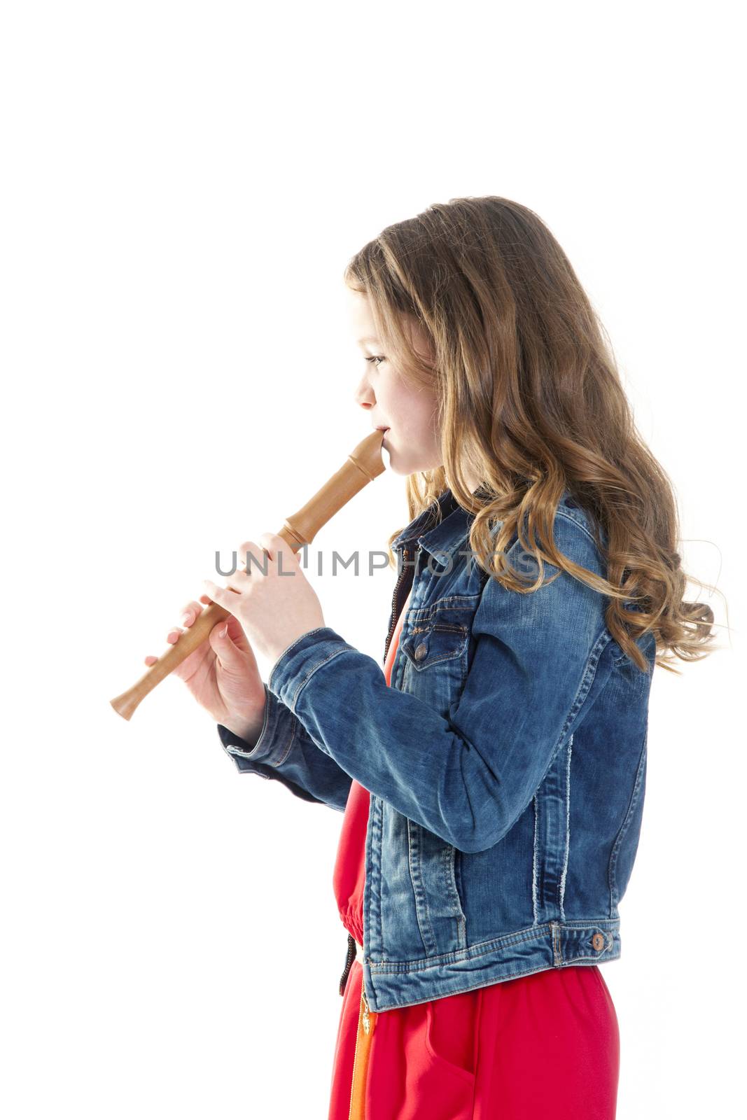 young girl with soprano recorder and white background