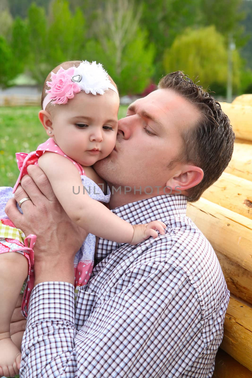 Father and daughter playing outside on the farm 