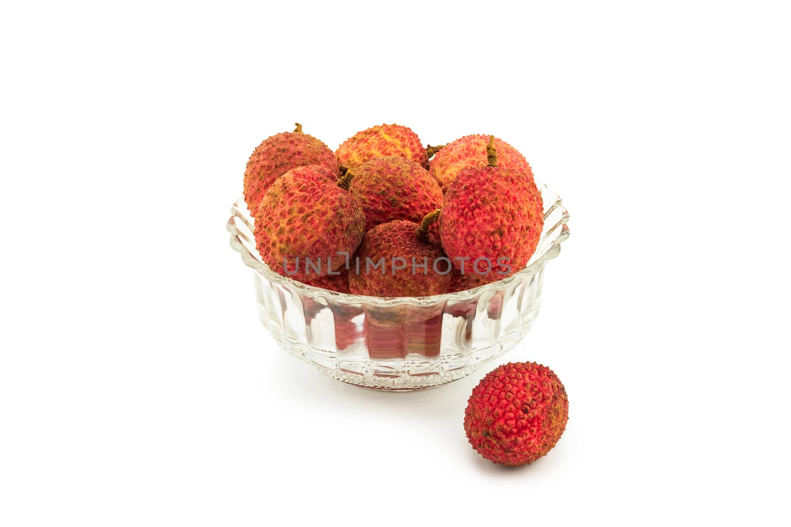 Lychee in a glass bowl on white background