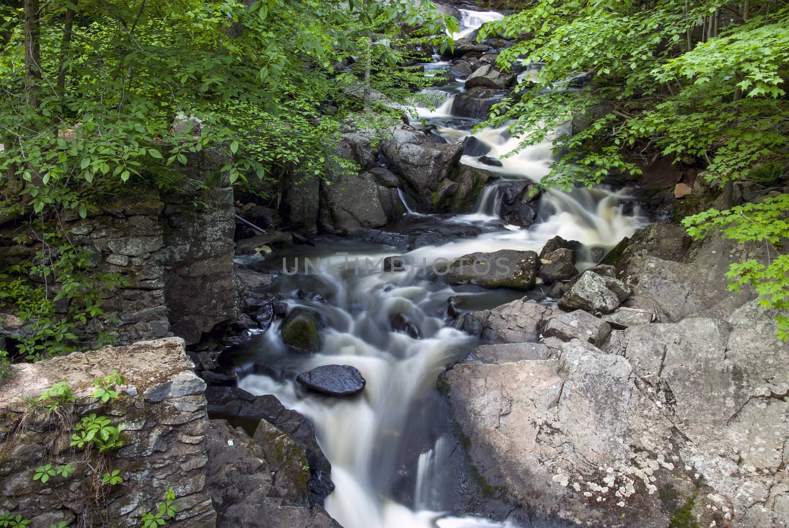 Water flowing through Southford falls in Spring,