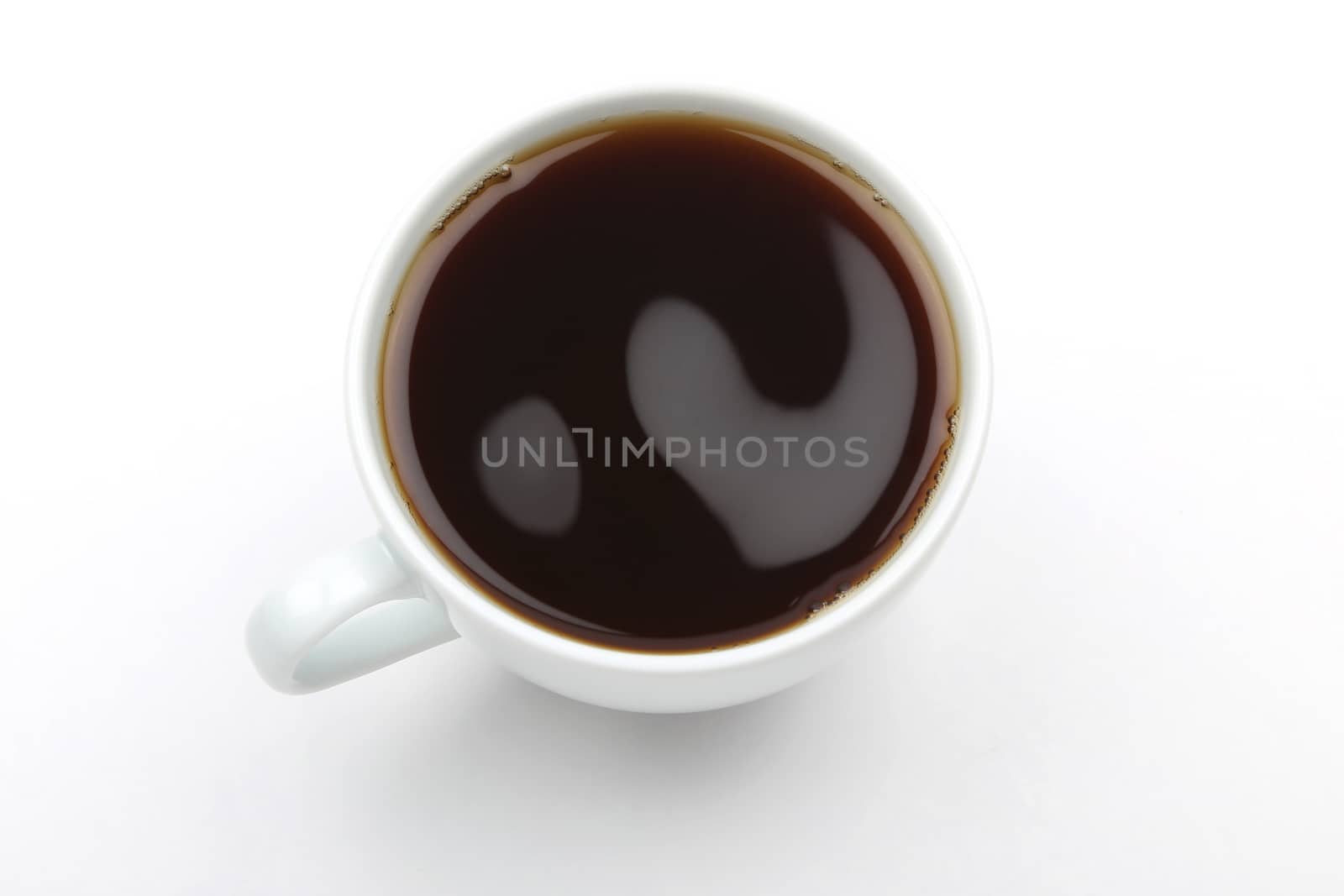 Top view of a cup of coffee isolated on white background 