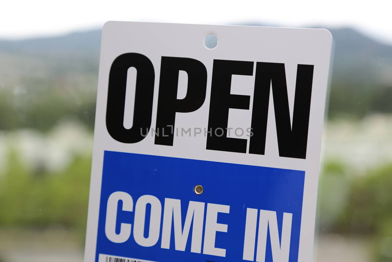 Come in and open sign with nature background