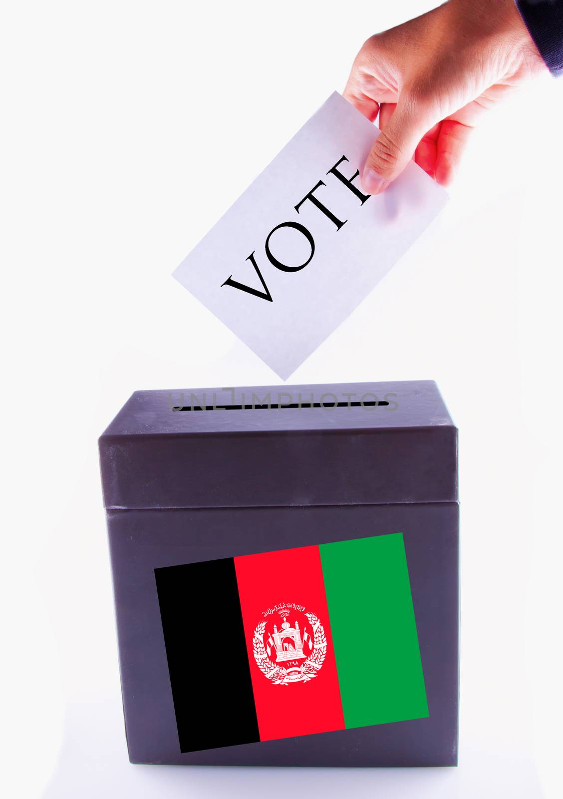 Urn for vote, with male hand posting vote and Afghanistan banner