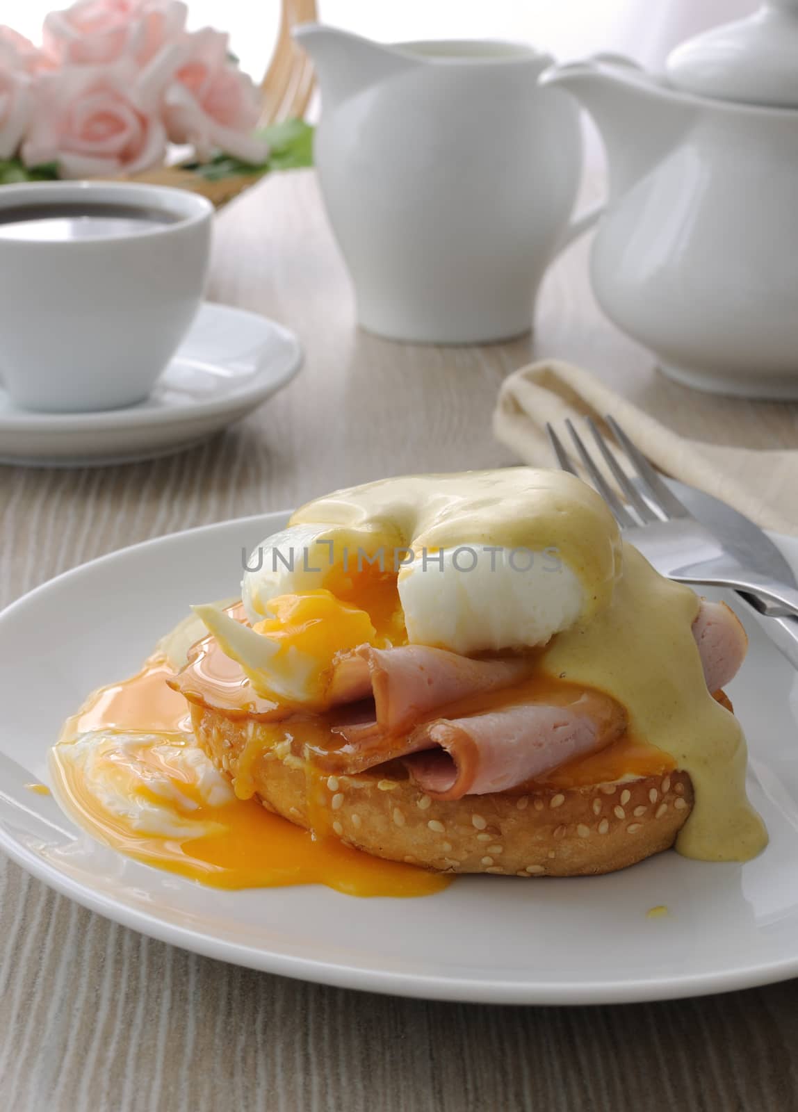 eggs (poached) with ham on a bun sauce by Apolonia