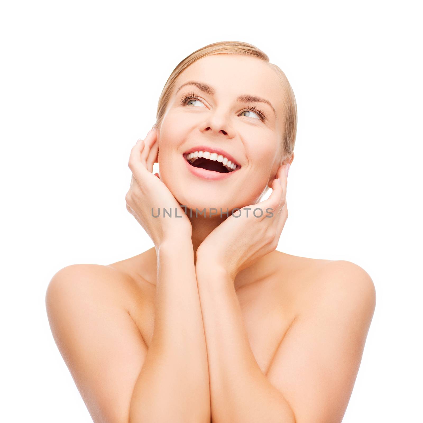 health and beauty concept - face of beautiful woman touching her ear